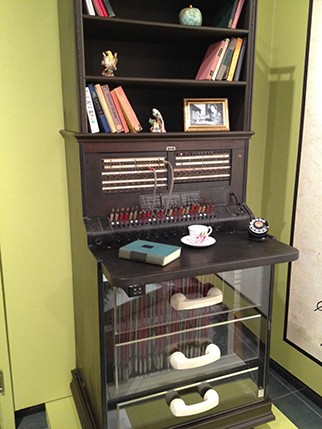 cupboard with books on shelves