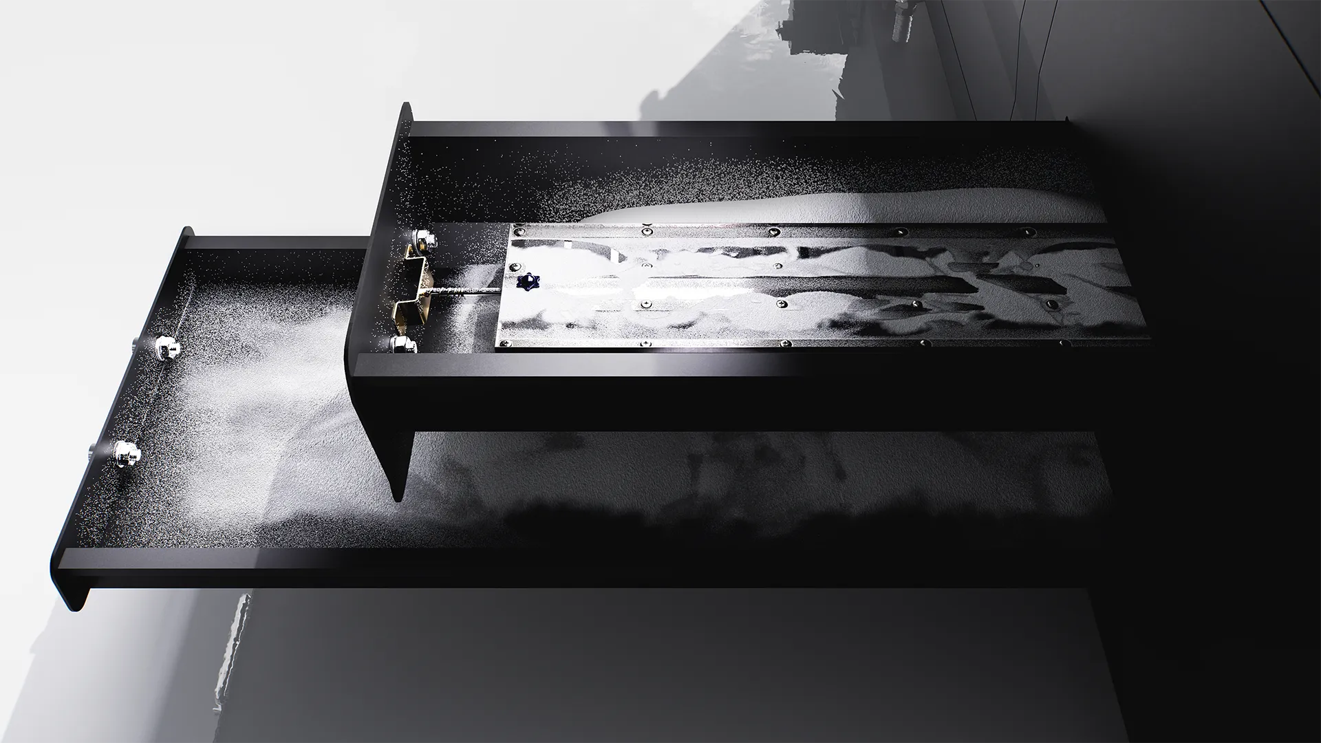 Close-up shot of the secondary hot melt powder catch tray in the Dune X powder shaker, designed to effectively collect falling powder during operation to prevent scattering and allow for efficient reuse, thereby reducing waste.
