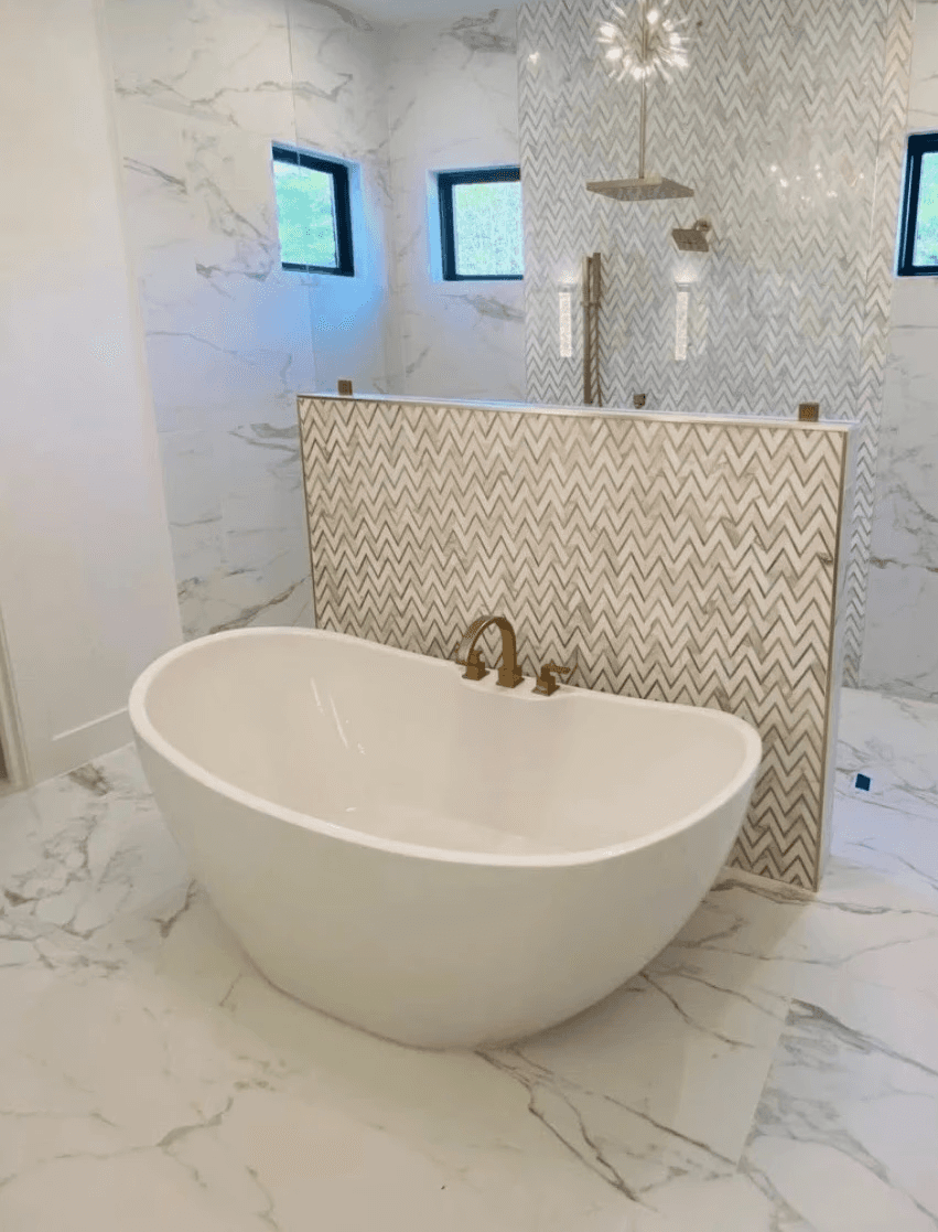 A man sanding a wooden table with a sander