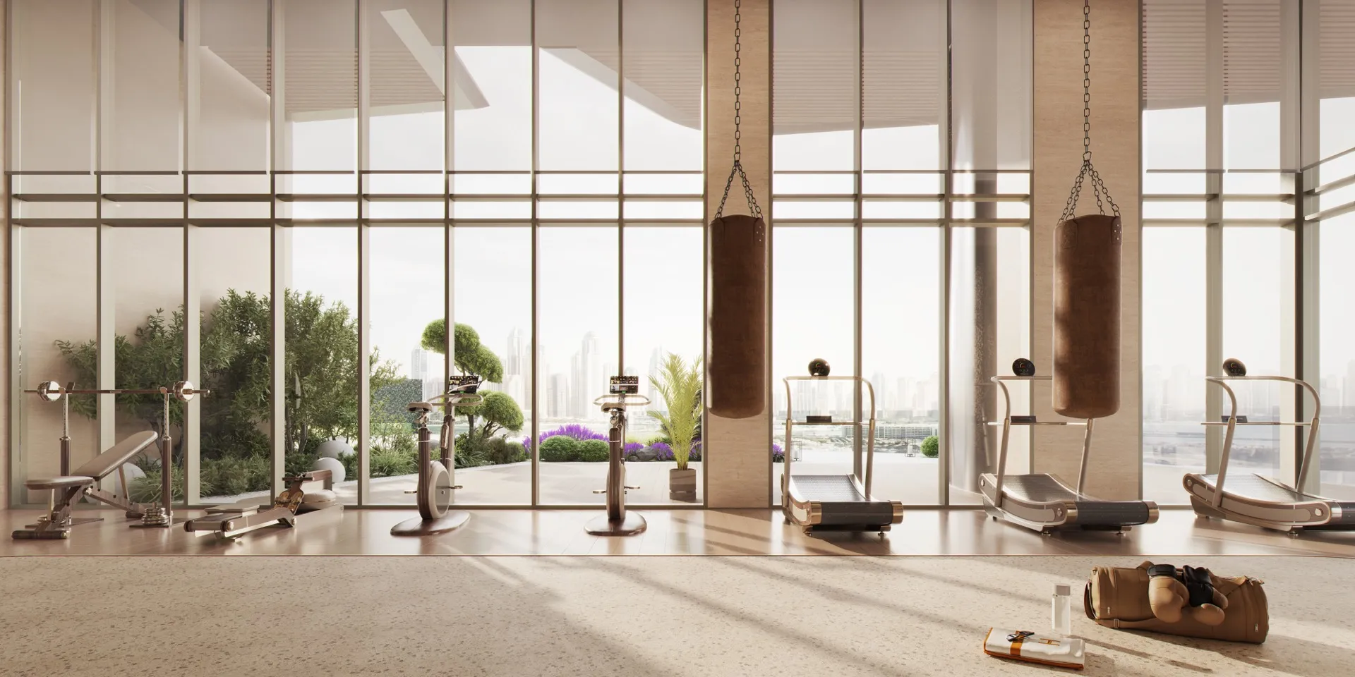 Modern fitness center at Sea Cliff with floor-to-ceiling windows, offering an elite wellness experience.