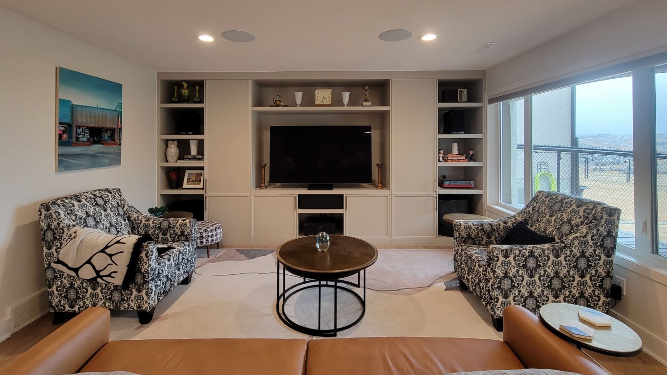 Image of Luxury home interior with KHD Homes design-build, featuring layout design, furniture, and window coverings.
