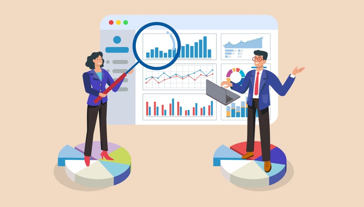 Two professionals analyzing charts and graphs, illustrating the difference between data science and data analytics roles and tools.