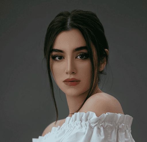 woman in white off shoulder dress