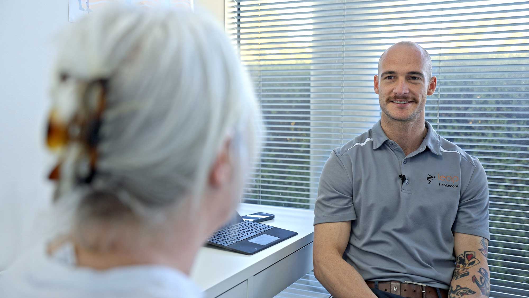 Daniel, consulting a physio patient