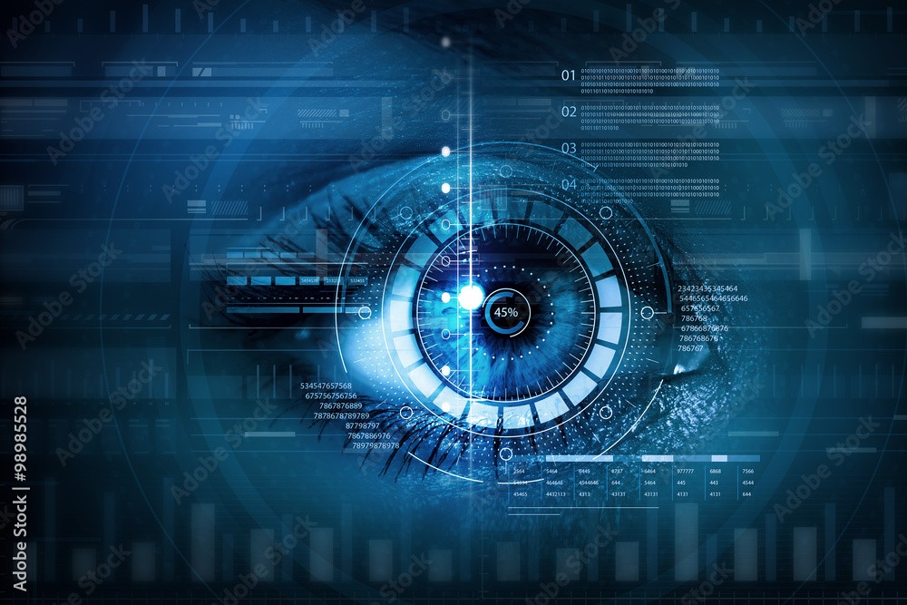 A close up of a blue eyeball in the dark