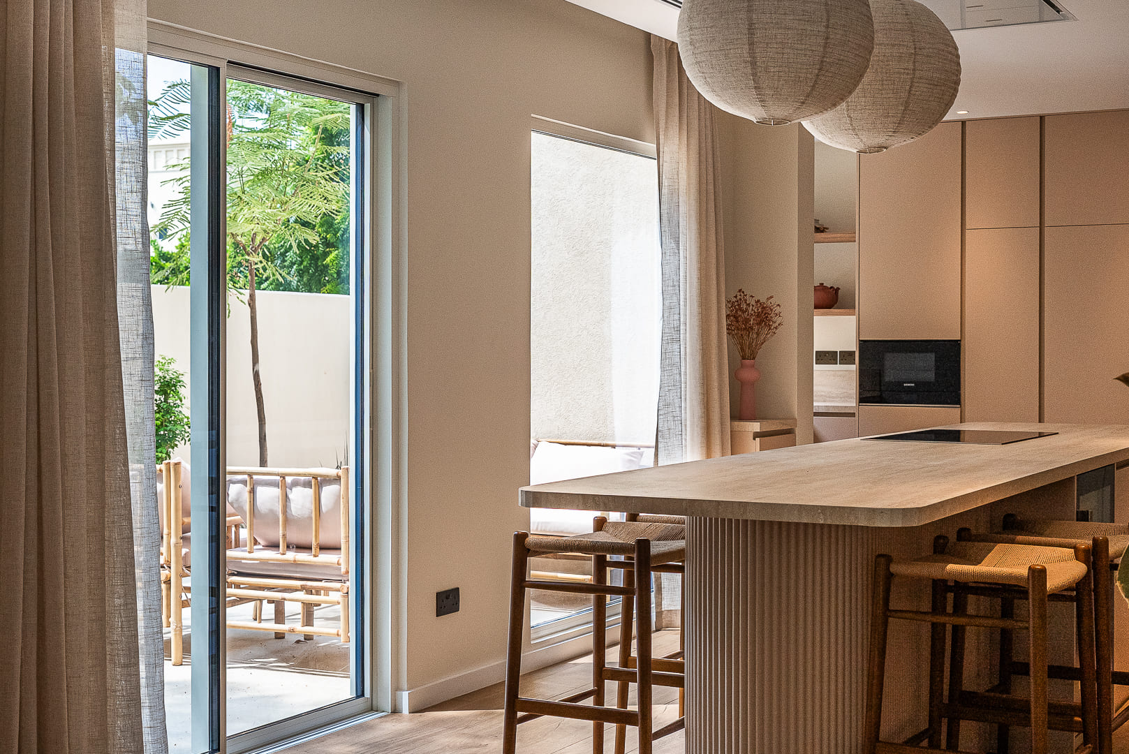 Image of big glass windows in a dinning area