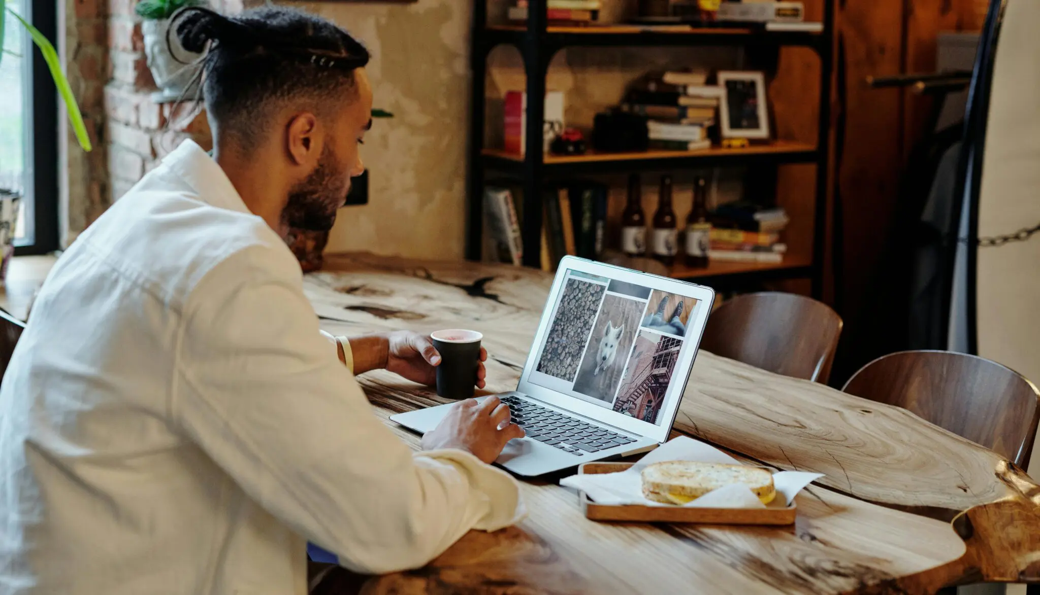 Young man focused on his laptop