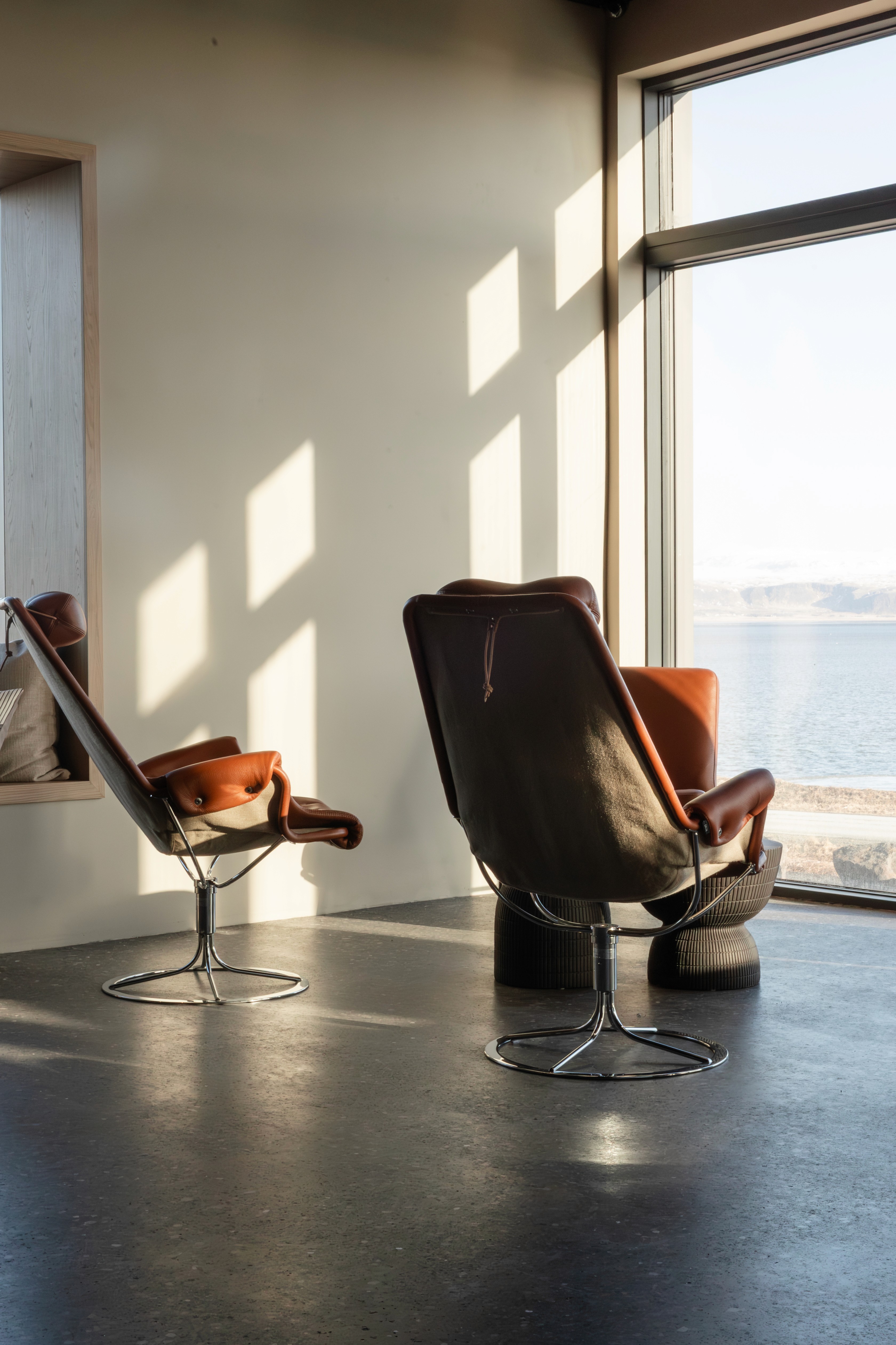 Luxury suite at Black Sand Hotel with sea view and modern Nordic décor.