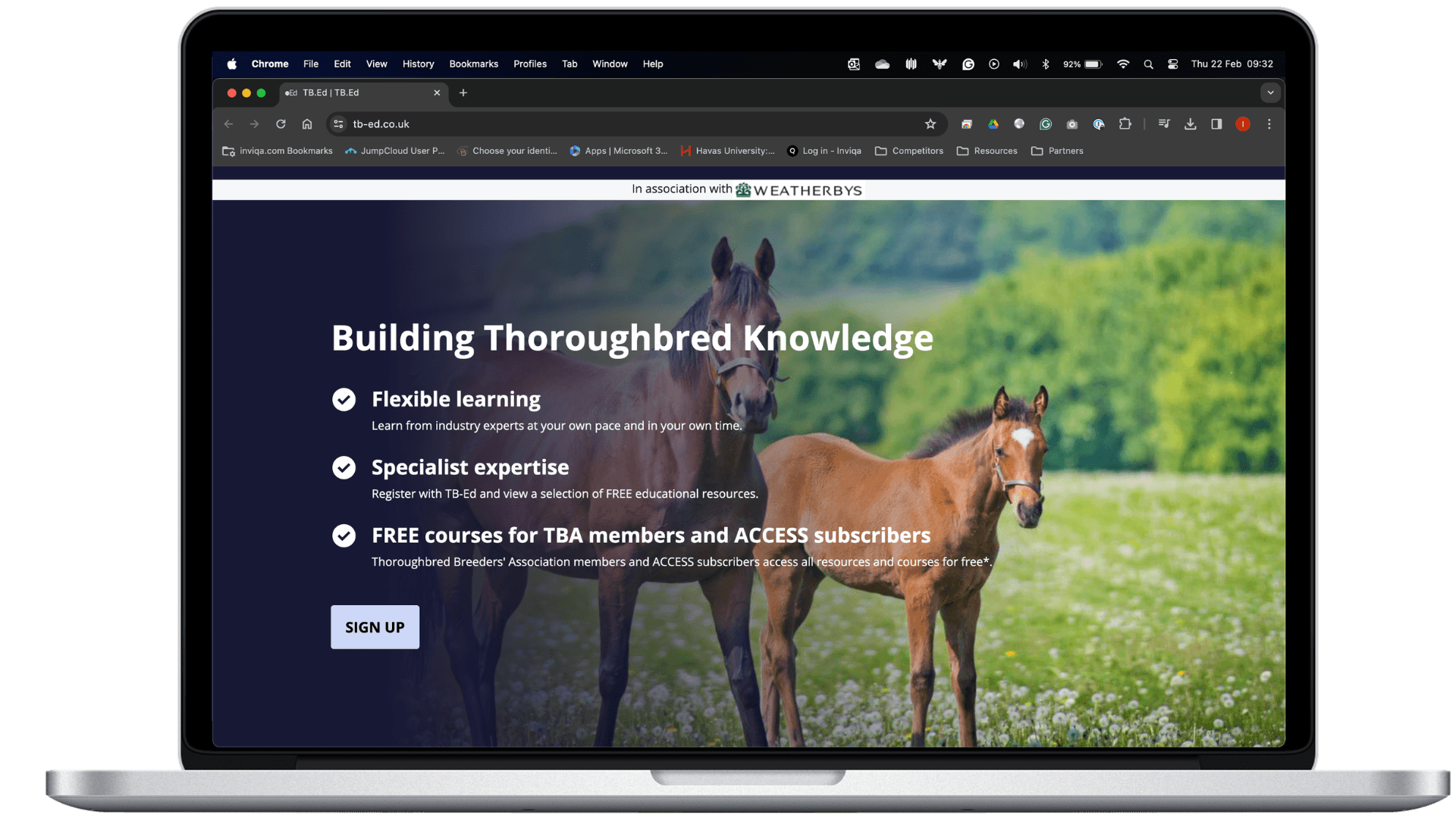 TBA website on laptop