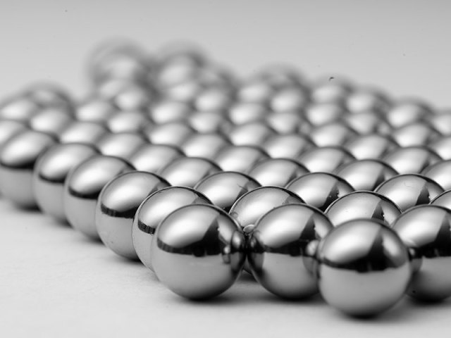 Steel balls on dark surface