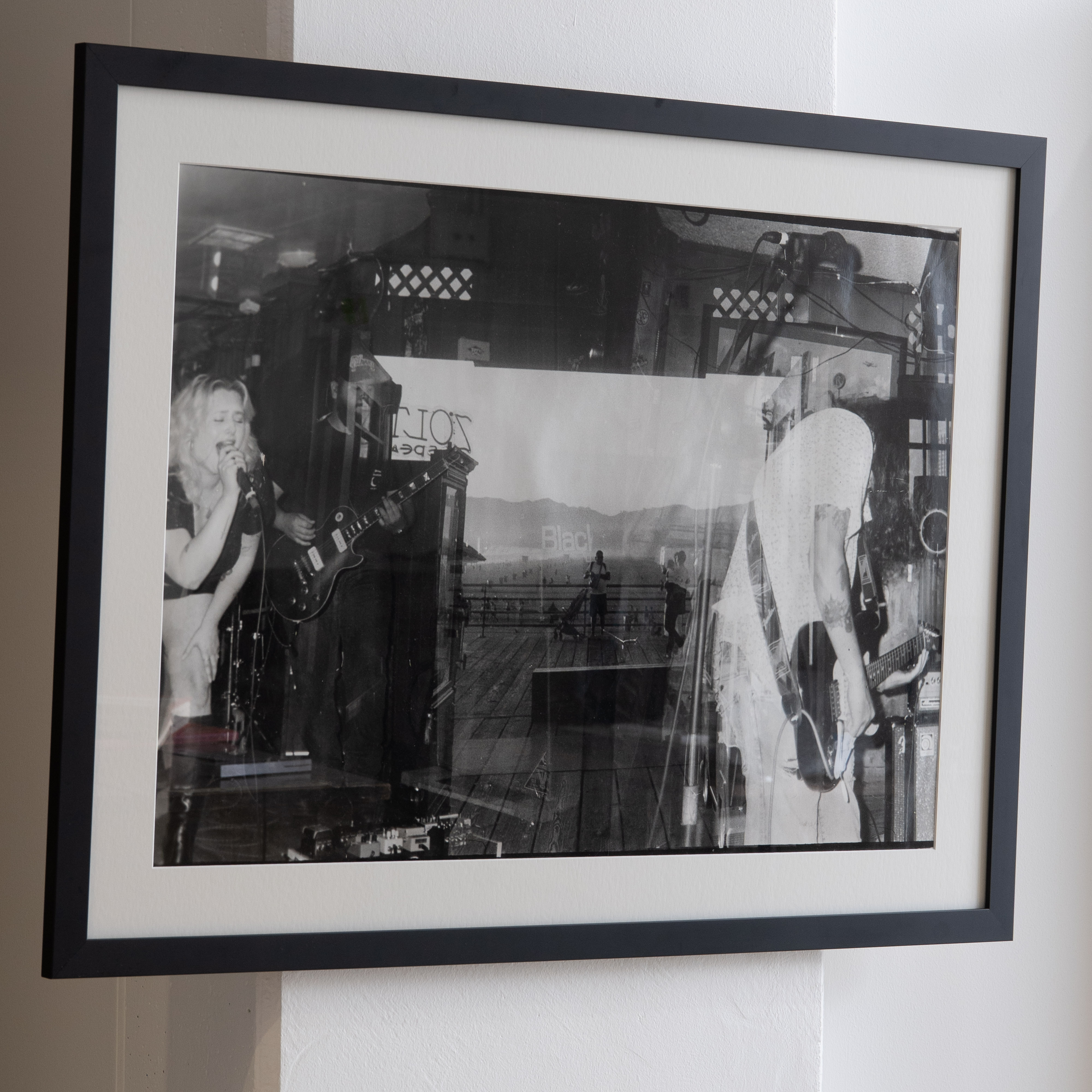 Darkroom prints drying on wire racks