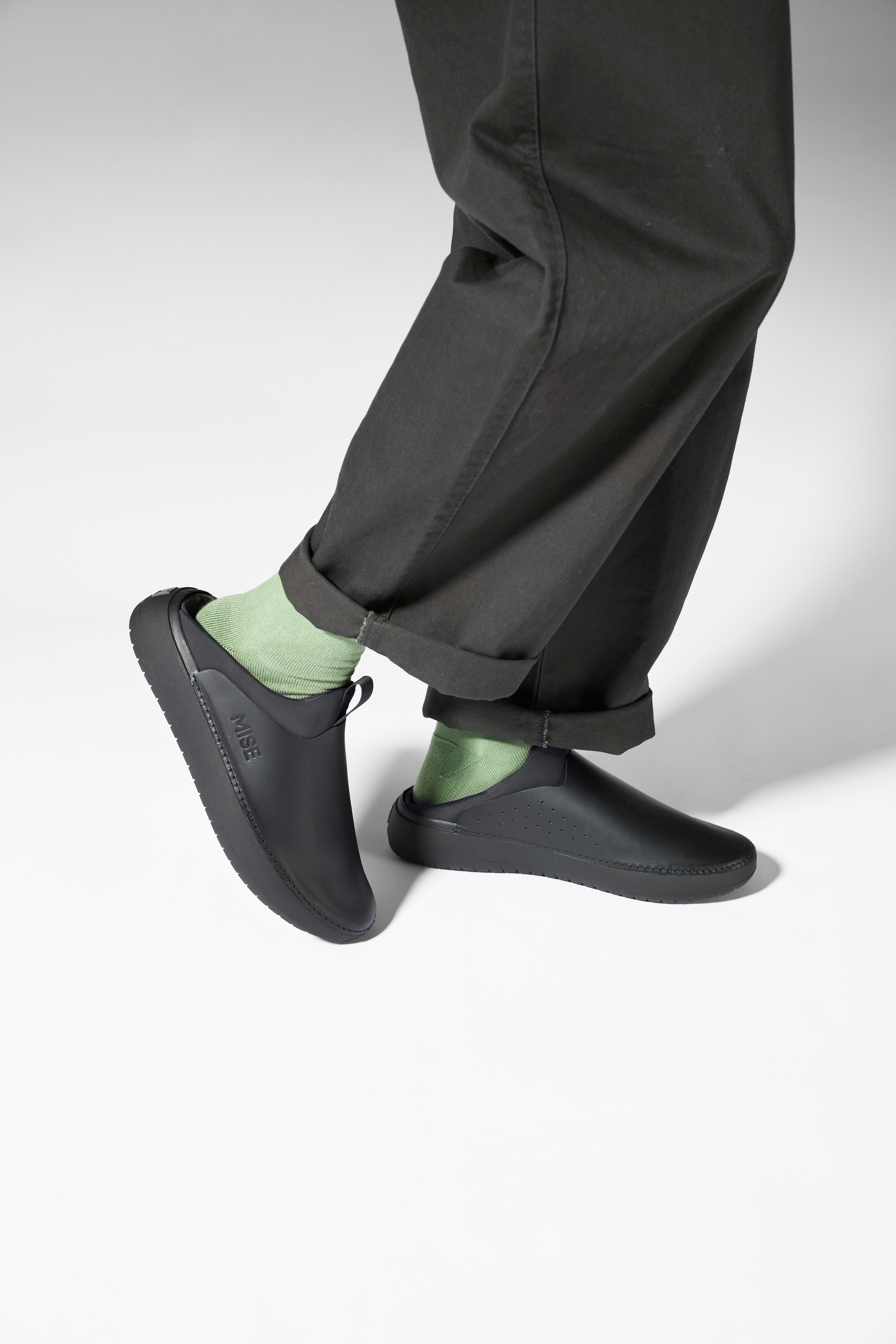 The Relaxed 2 MISE kitchen shoe in black on foot heel collapsed side view