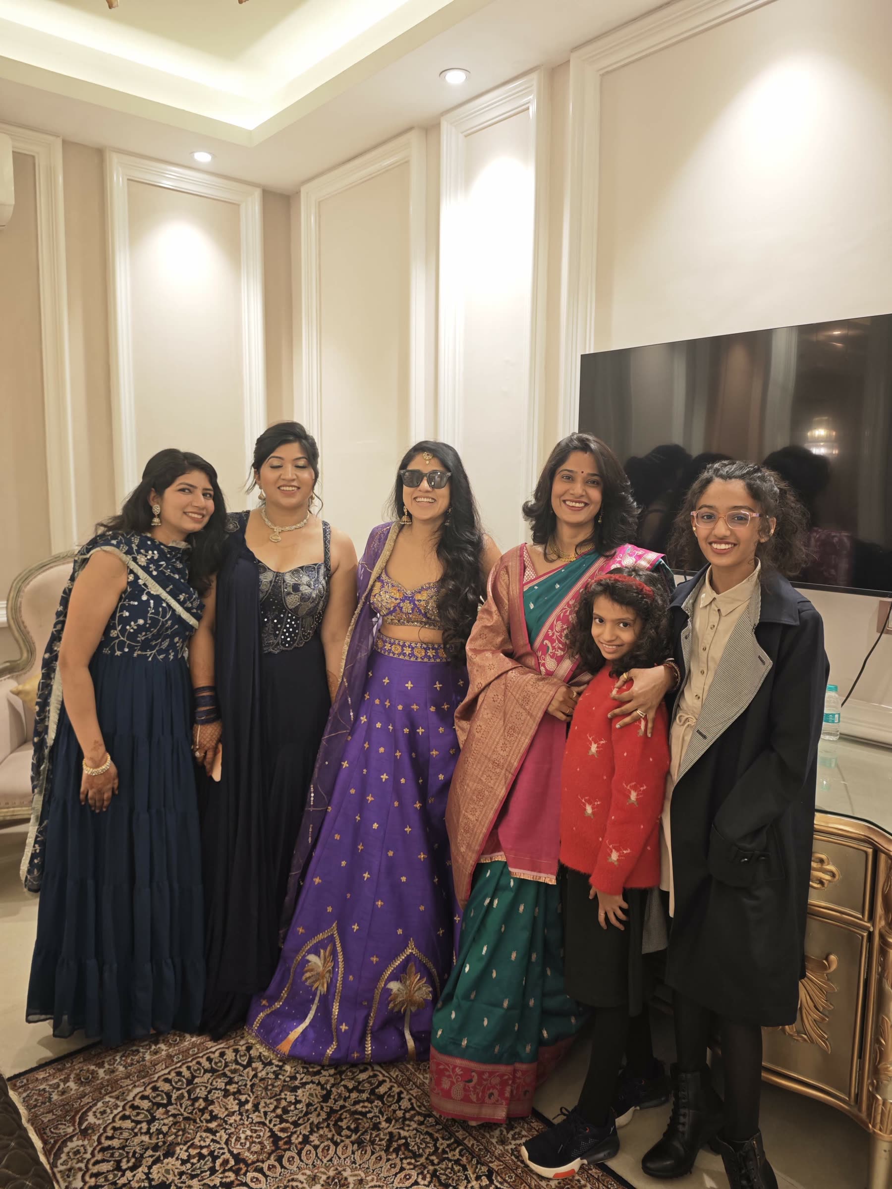 Sarika surrounded by women and children