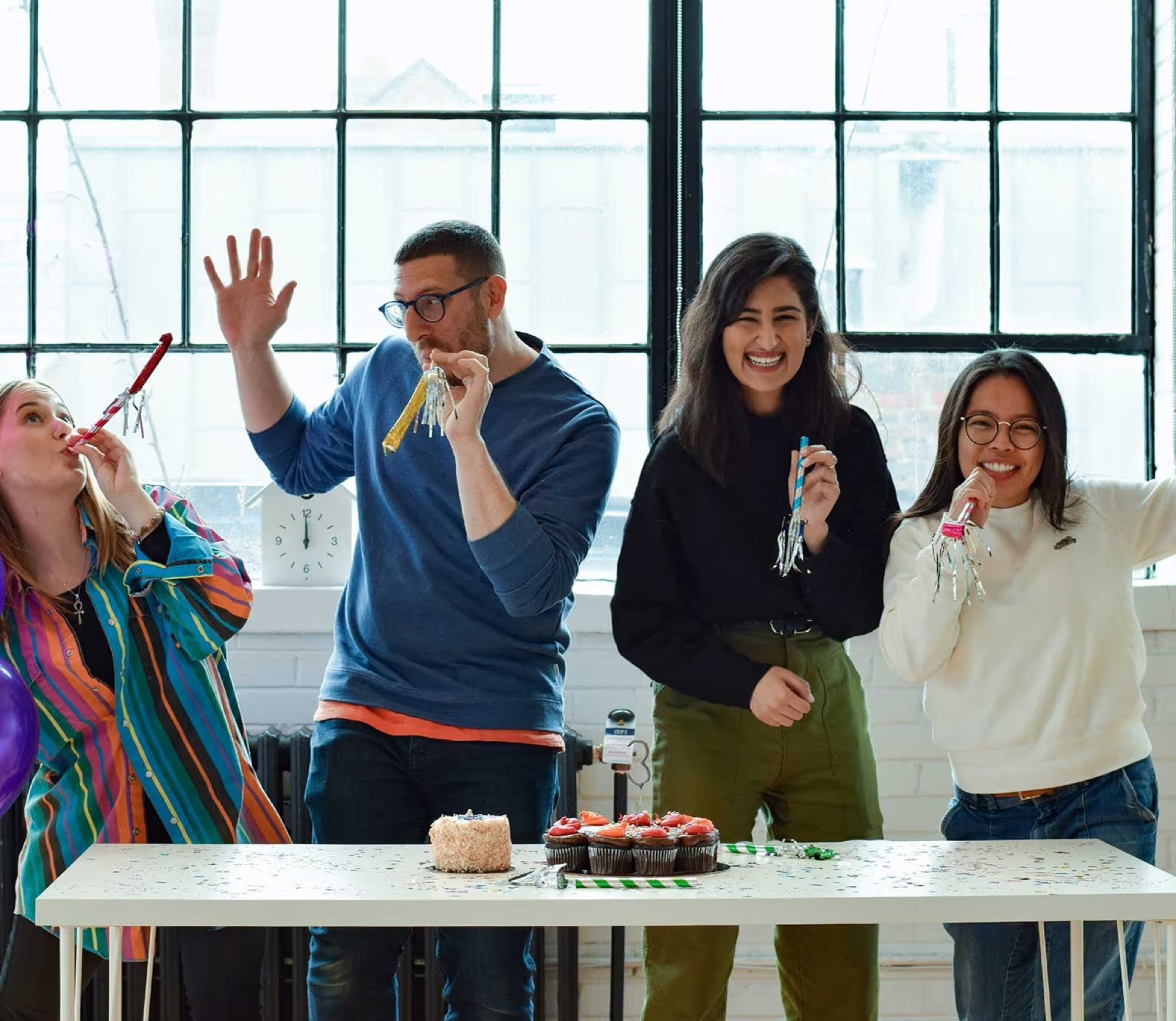 LOI founders celebrating together at a community event