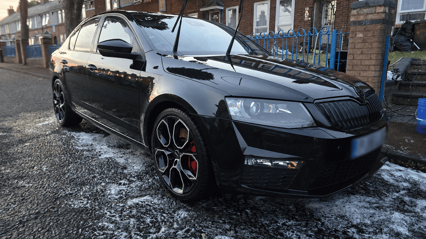 Black Škoda Octavia vRS during the detailing process