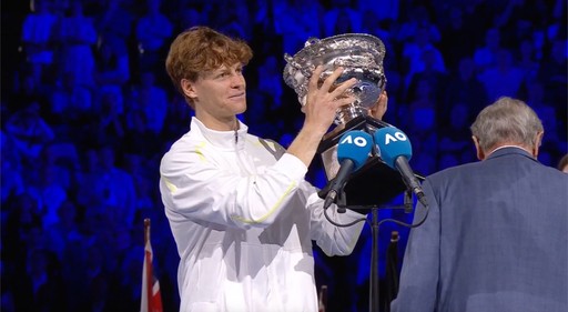 Sinner lifting his winner's trophy
