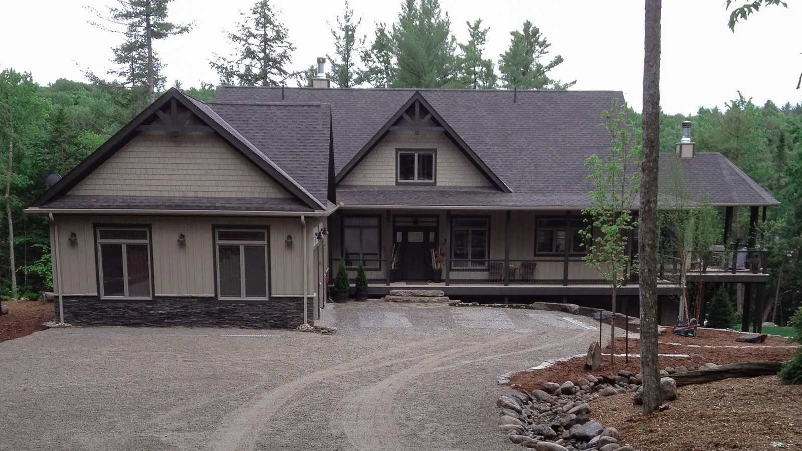 West shore cottage at the end of a professionally graded driveway.