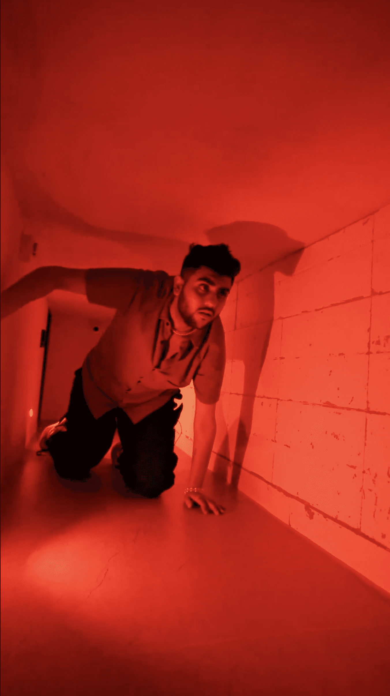 An Indian male teenager navigating through the mystery escape games