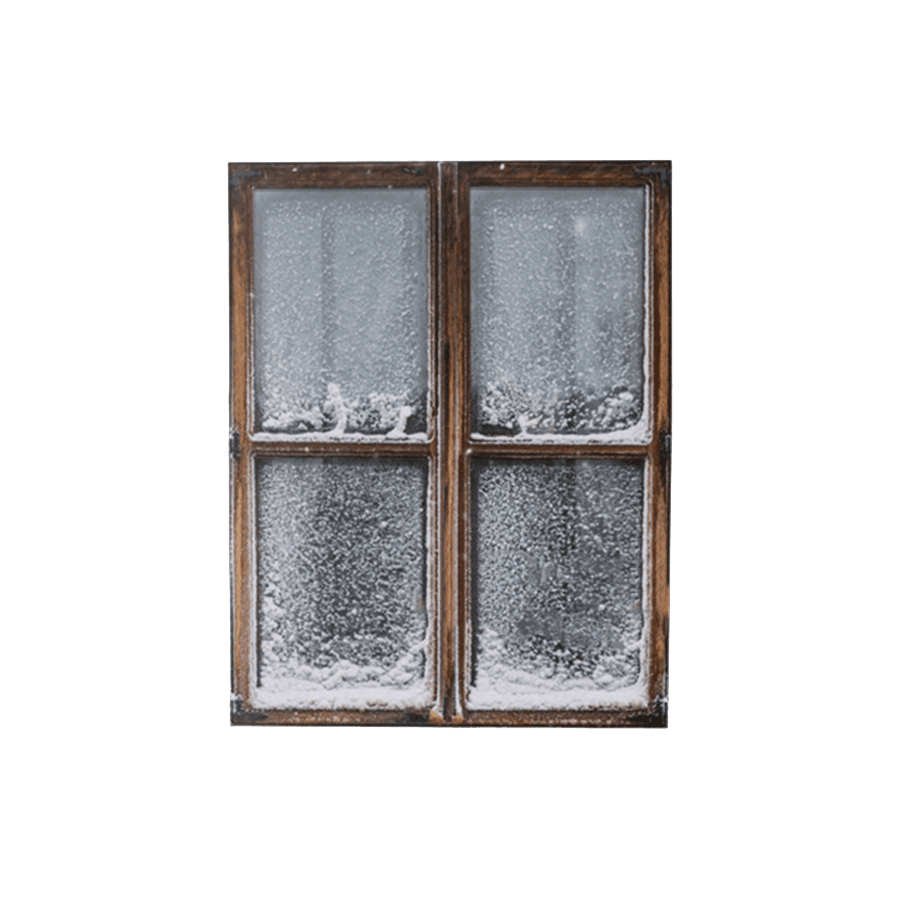 Four-pane window with frost on the glass