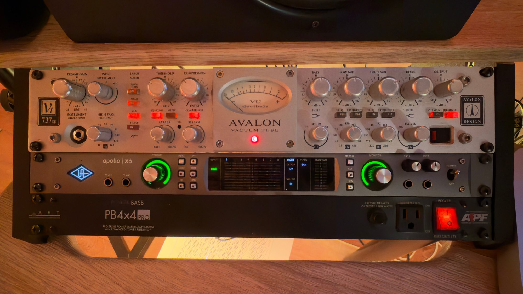 igh-end studio gear rack featuring an Avalon preamp and UAD Apollo interface for premium vocal recording at Red Mile Records in Calgary.