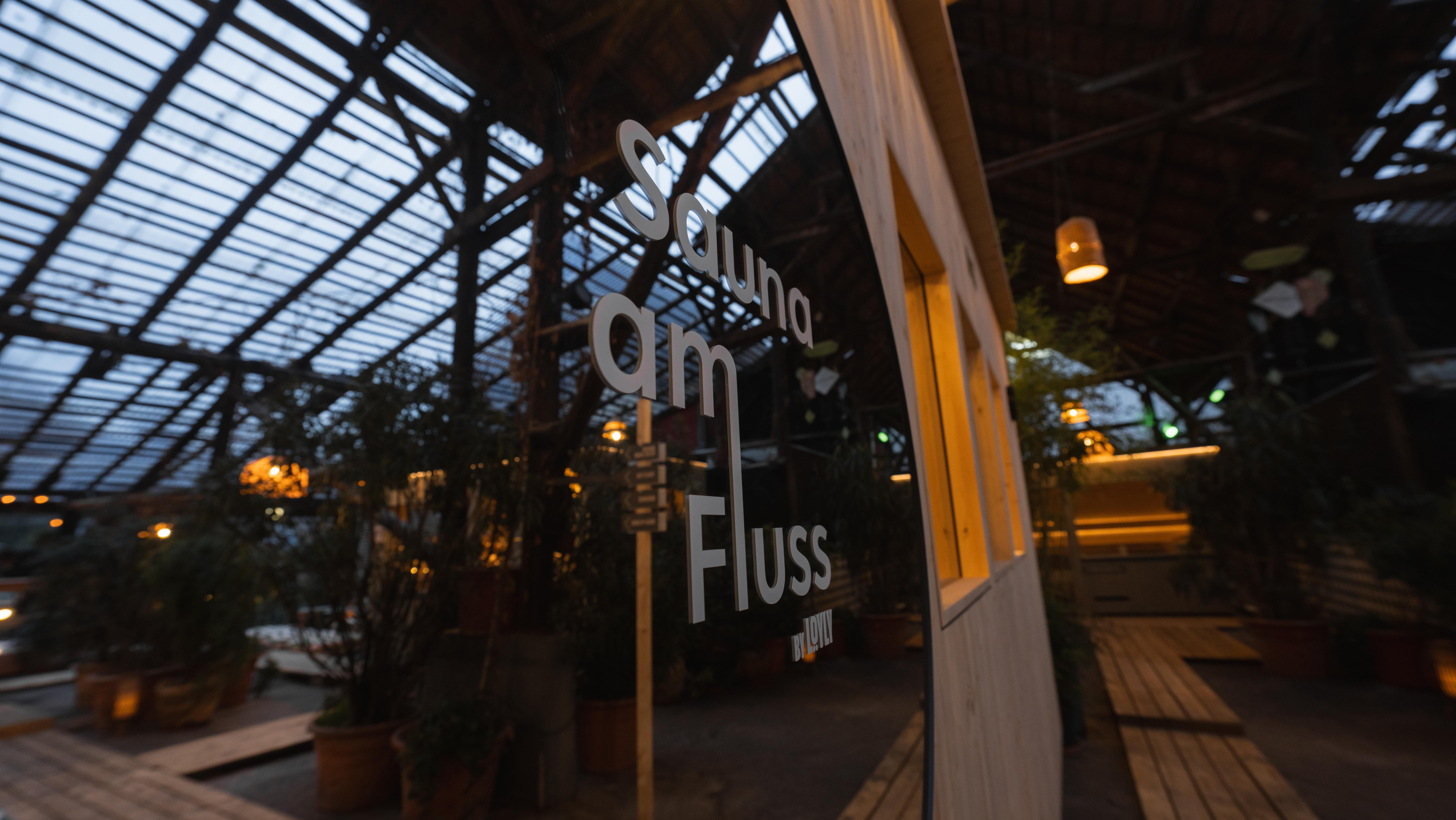 Sauna am Fluss logo auf Spiegel