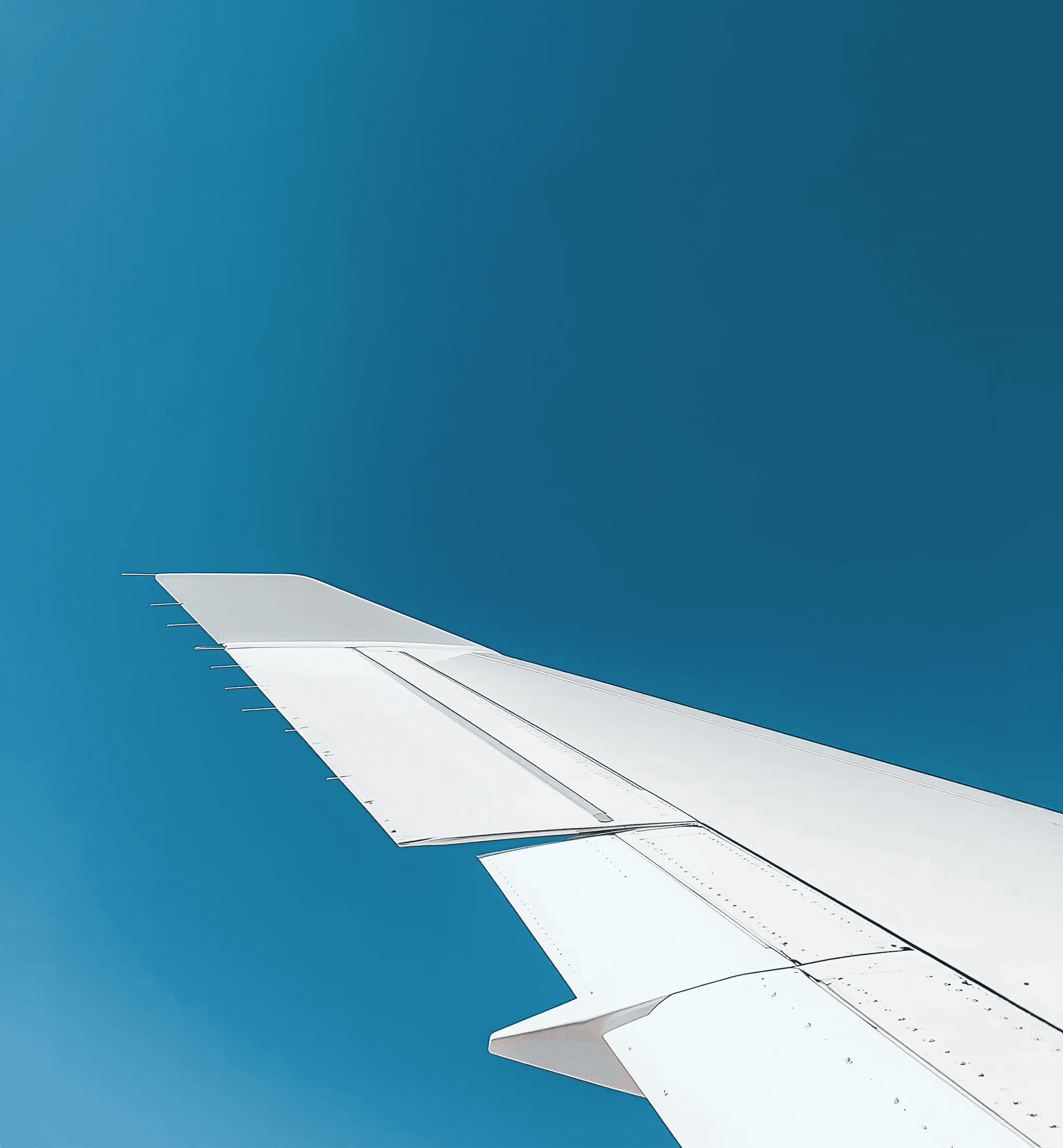 Plane wing in the sky