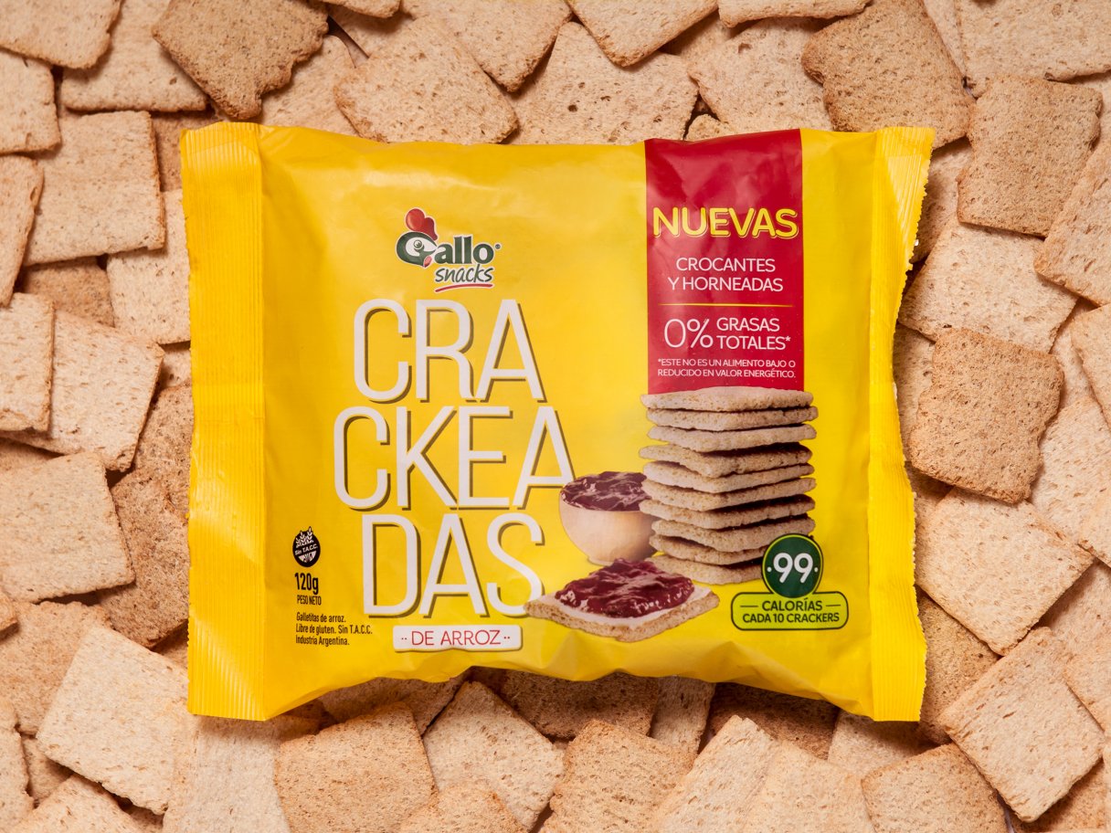 Rooftops of a coastal town with the sea in background