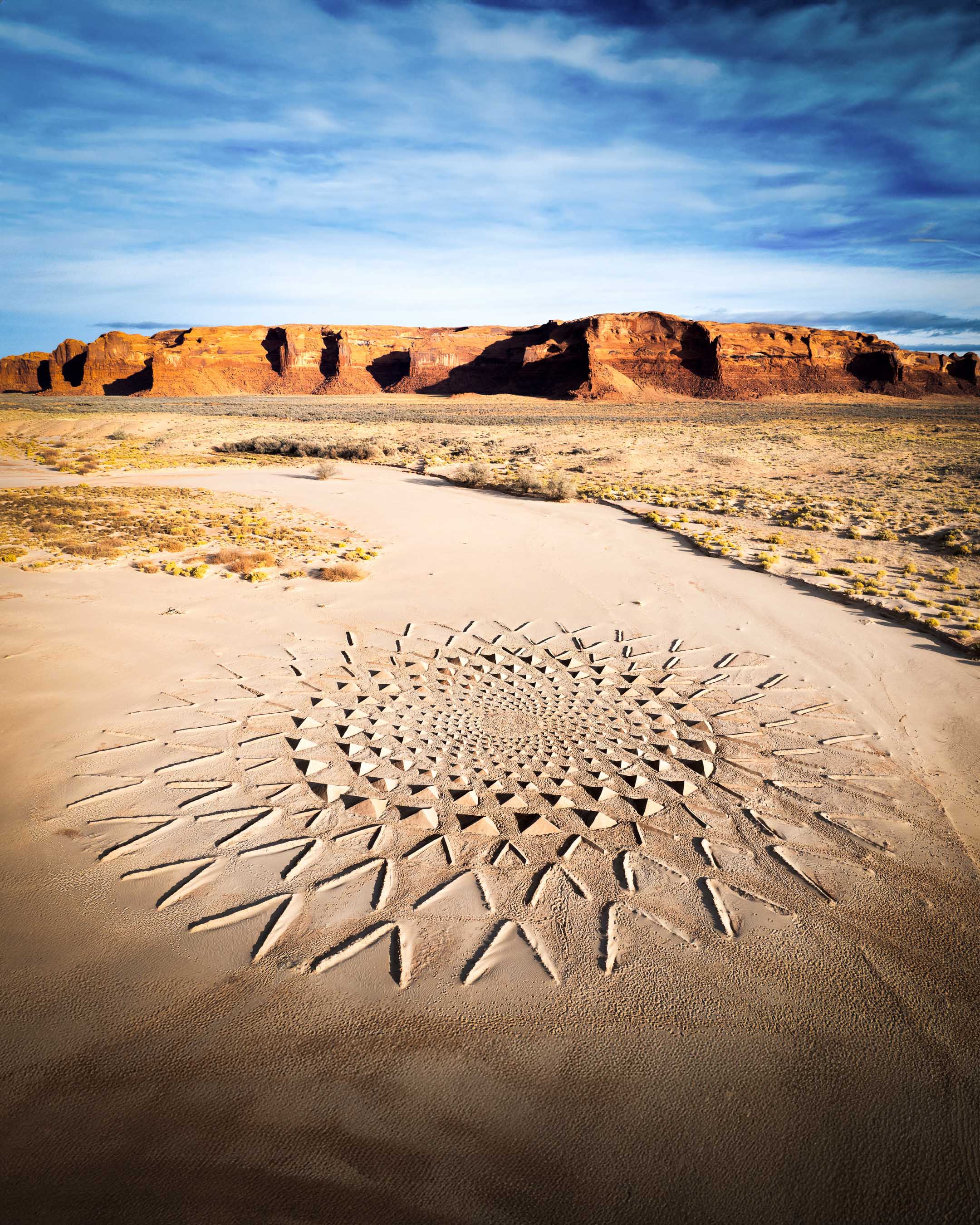 Land art the size of a football field in a riverbed designed by Owen Brown and Jim Denevan for the band A R I Z O N A