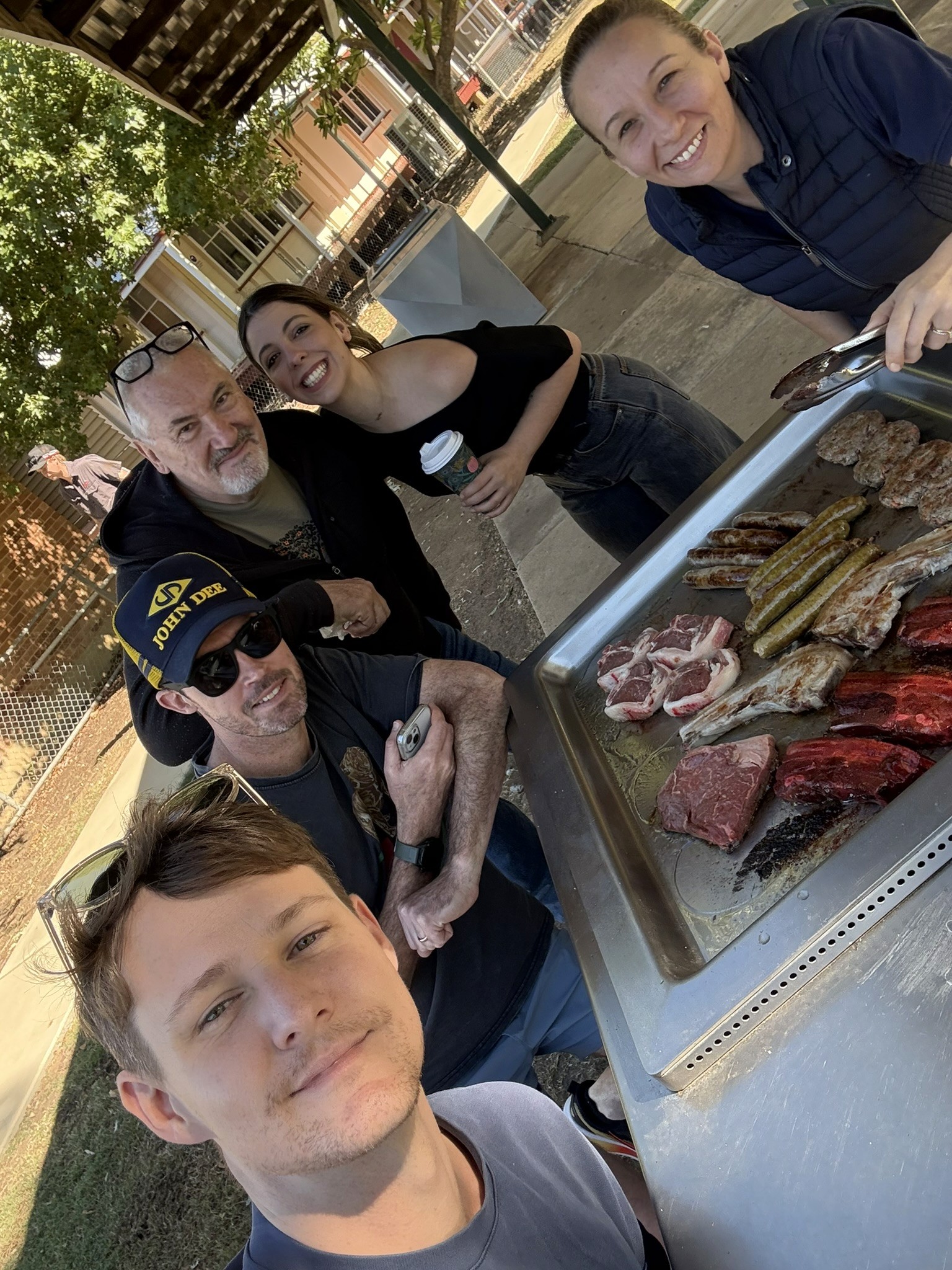 Wine & Dine'm staff enjoying their meat raffle winnings the day after another successful Festival of Outback Opera Long Lunch