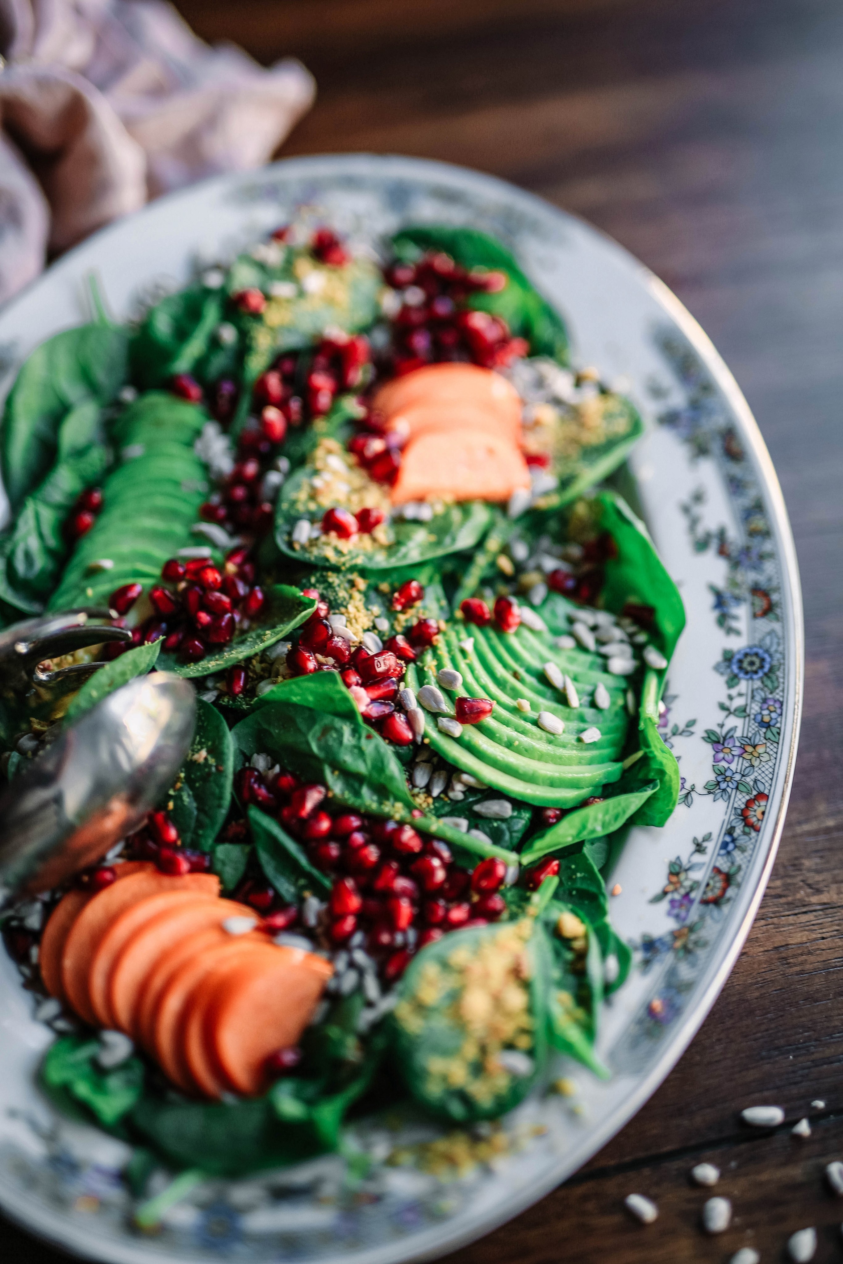 Green salad with carrots, nuts and other ingredients