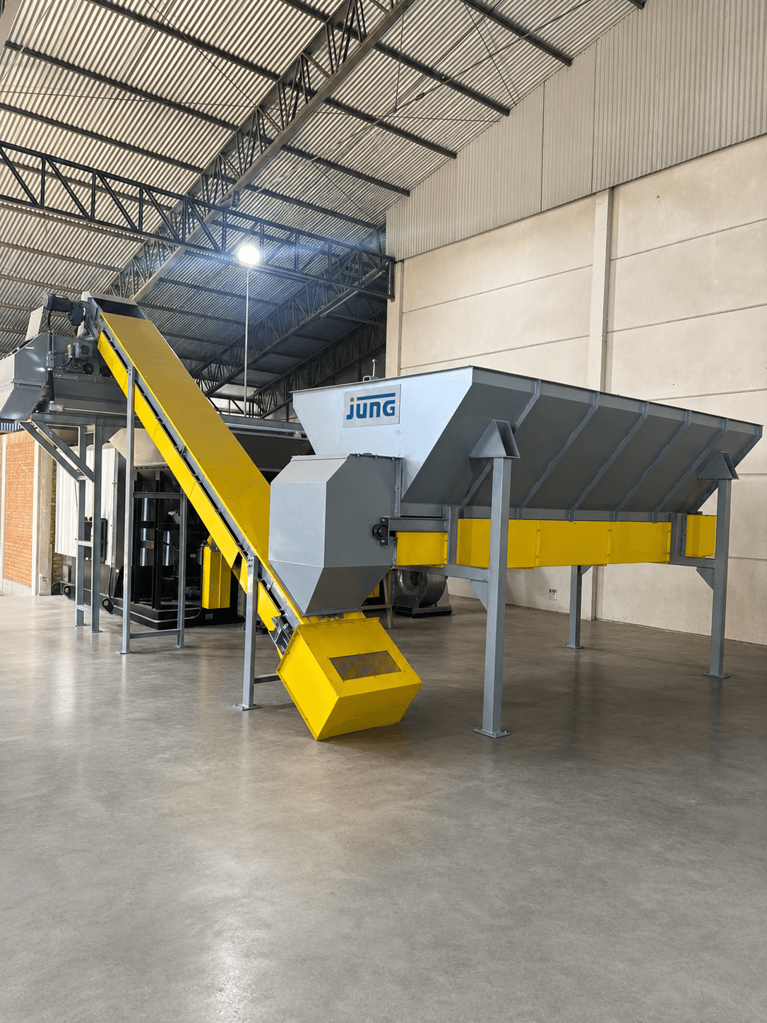Alimentador automático de biomassa