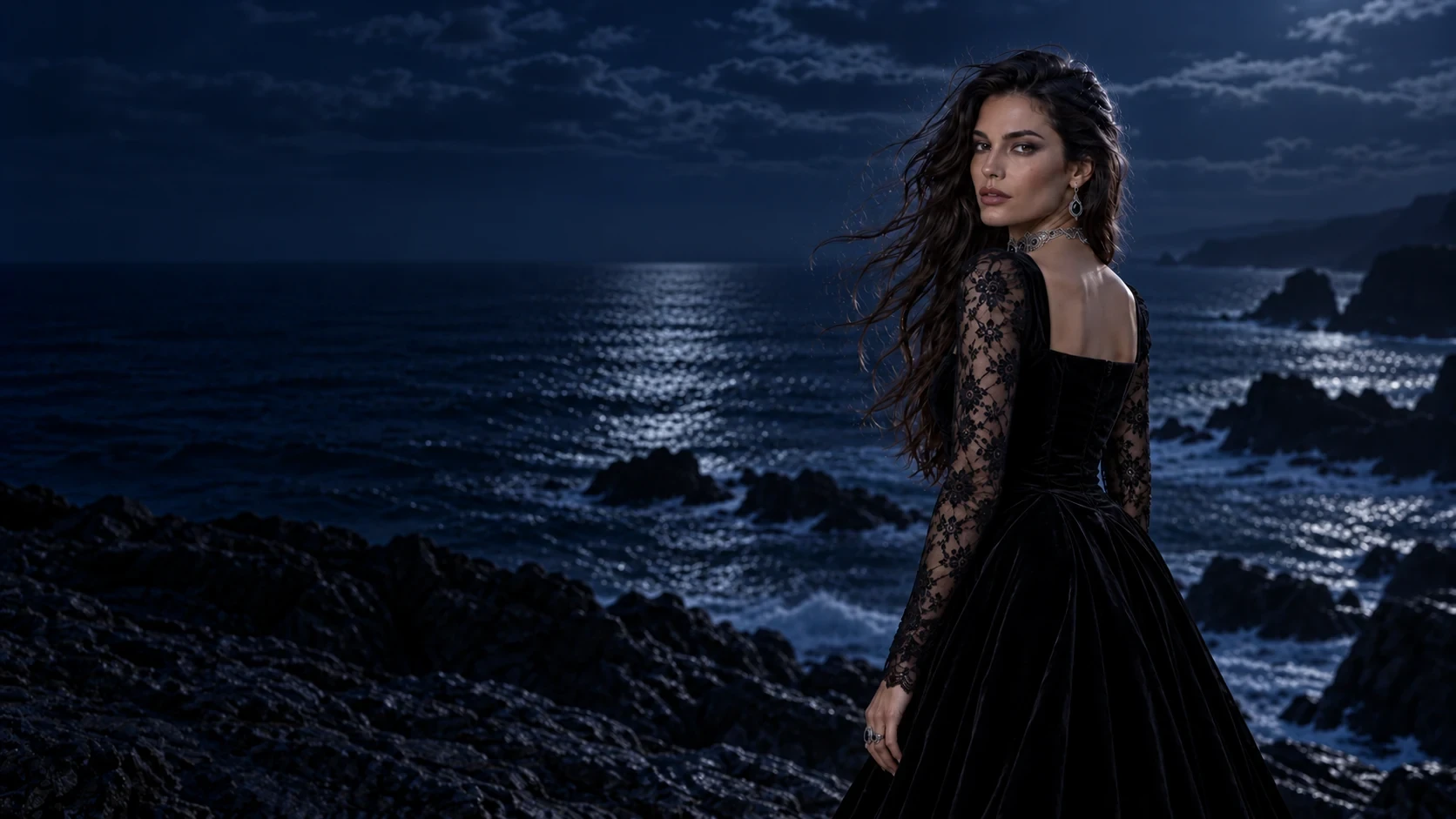 Ines Calder looking back toward the camera at the moonlight coast