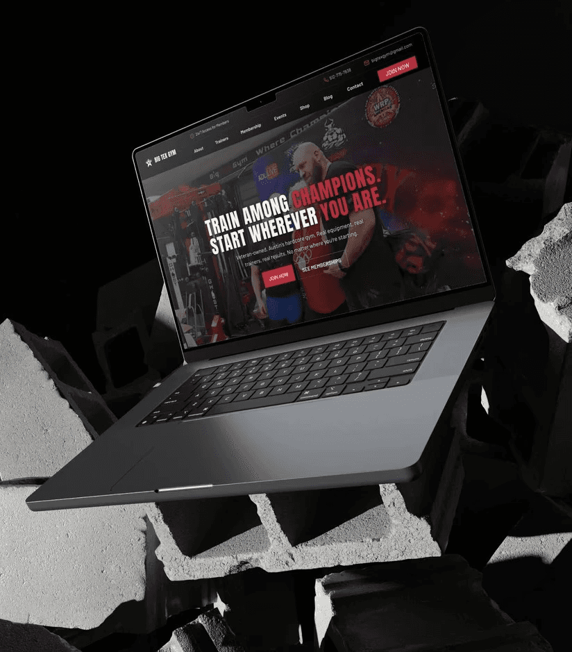 A laptop on a futuristic stand displays a vibrant website against a dark background.