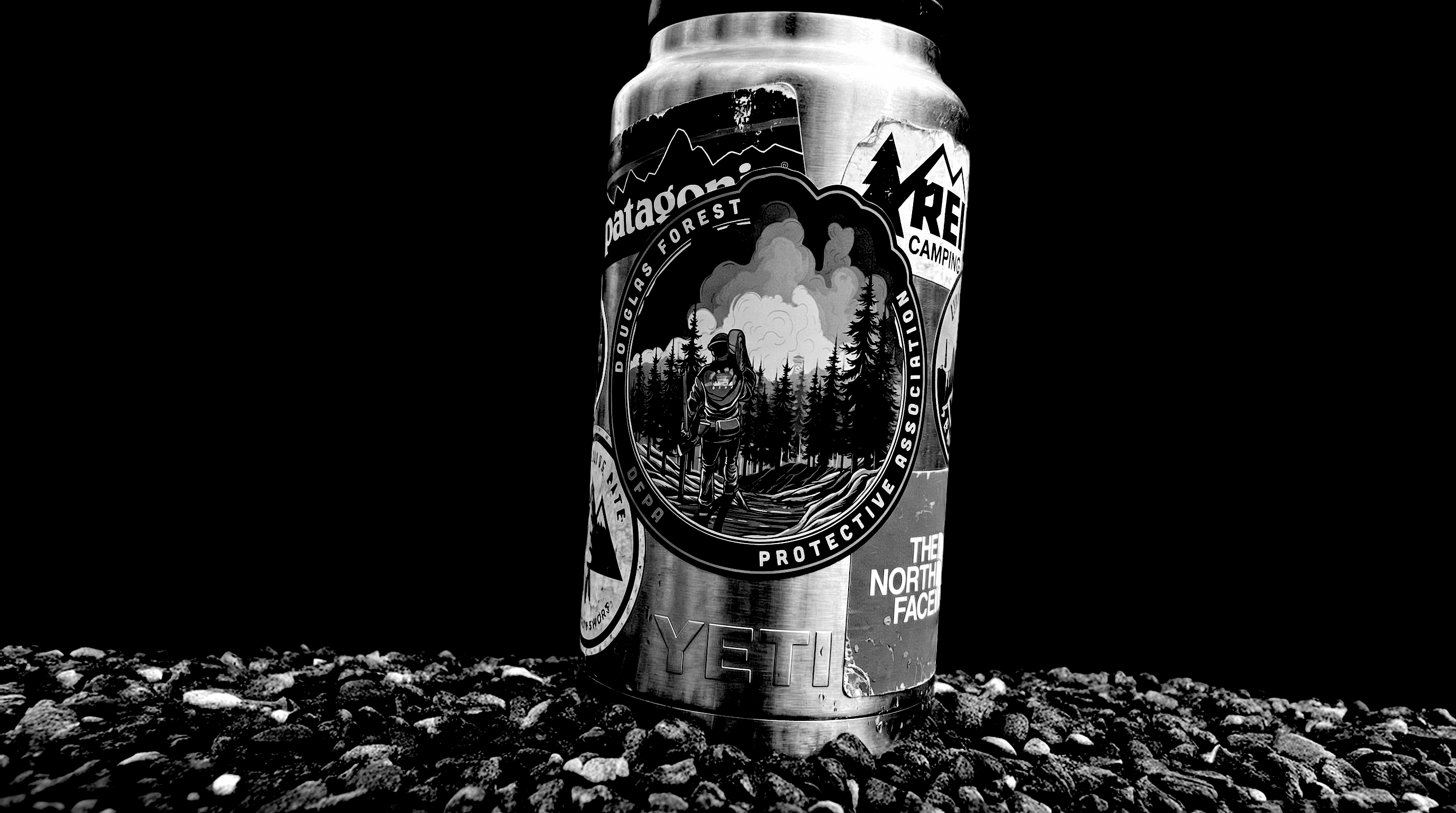 DFPA sticker on a metal Yeti bottle bottle against a dark background