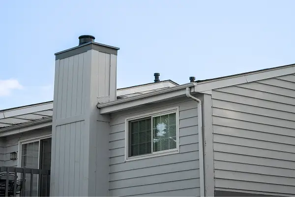 Roofing crew working on a residential roof