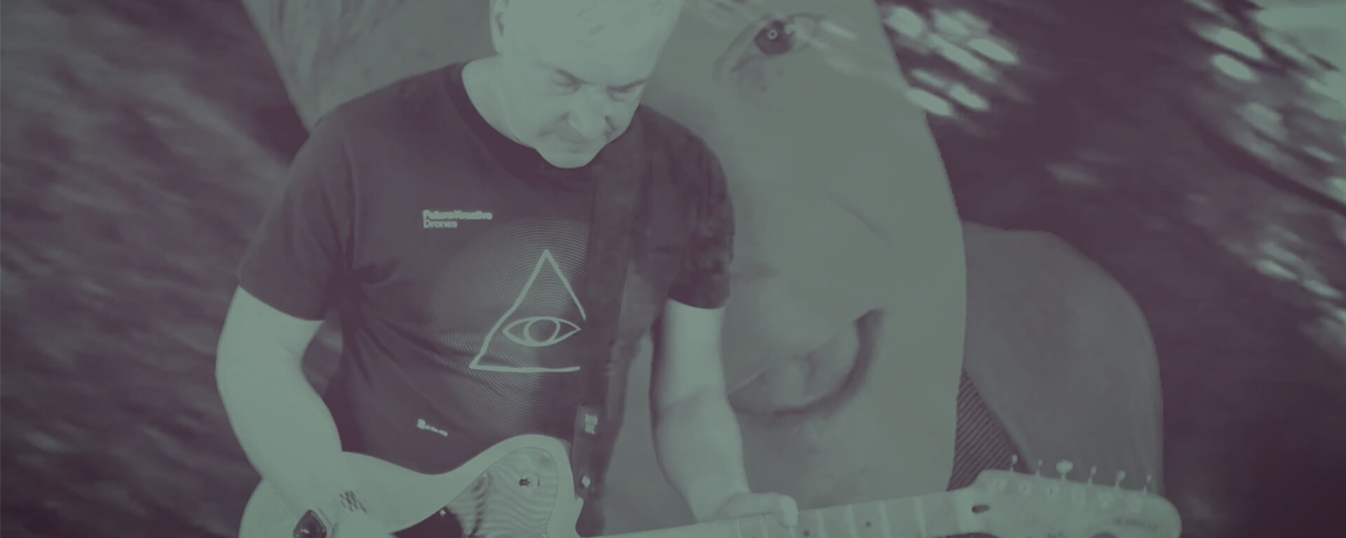 a man holding a cocktail