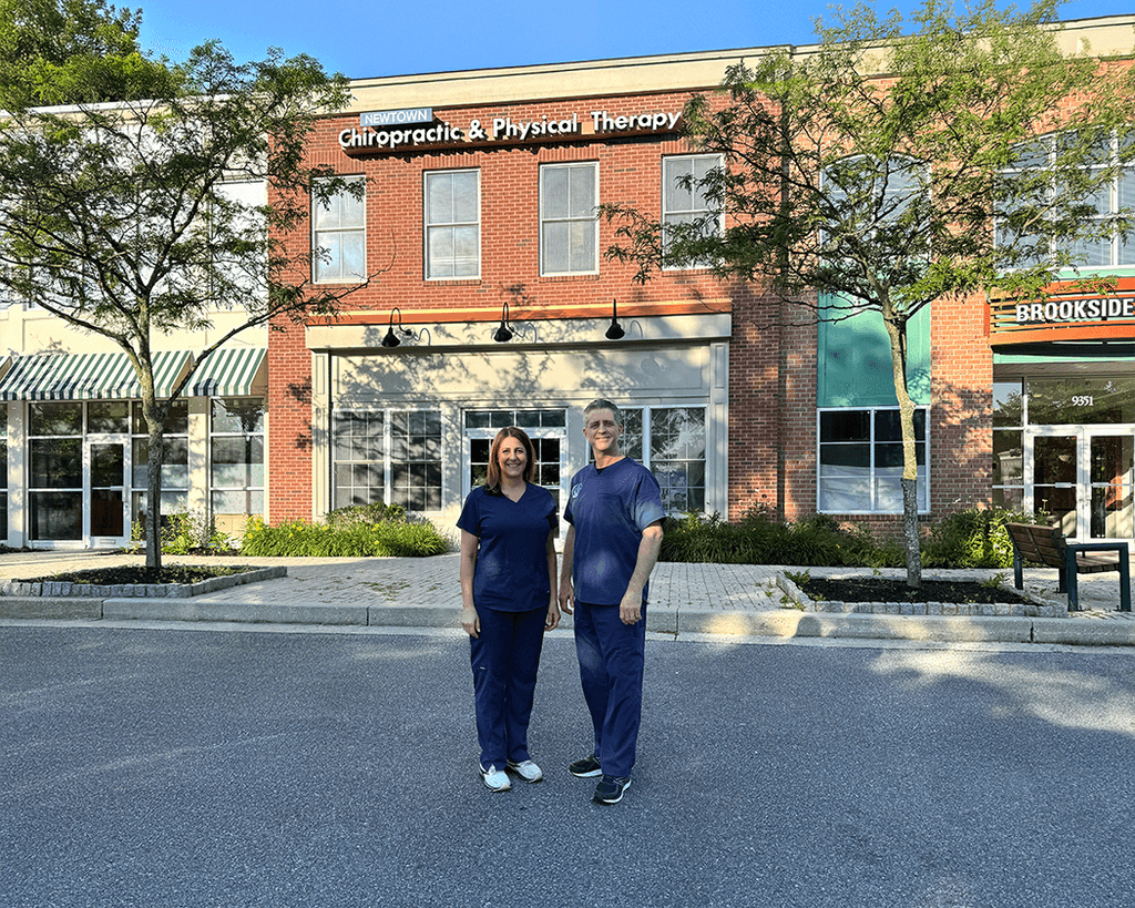Dr. Kersh and Robin outside practice building