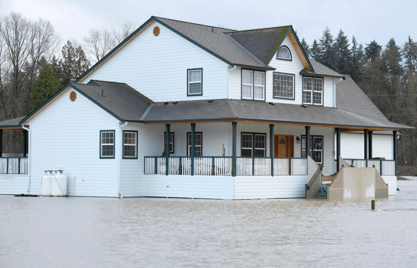 floodwaters surrounding a house