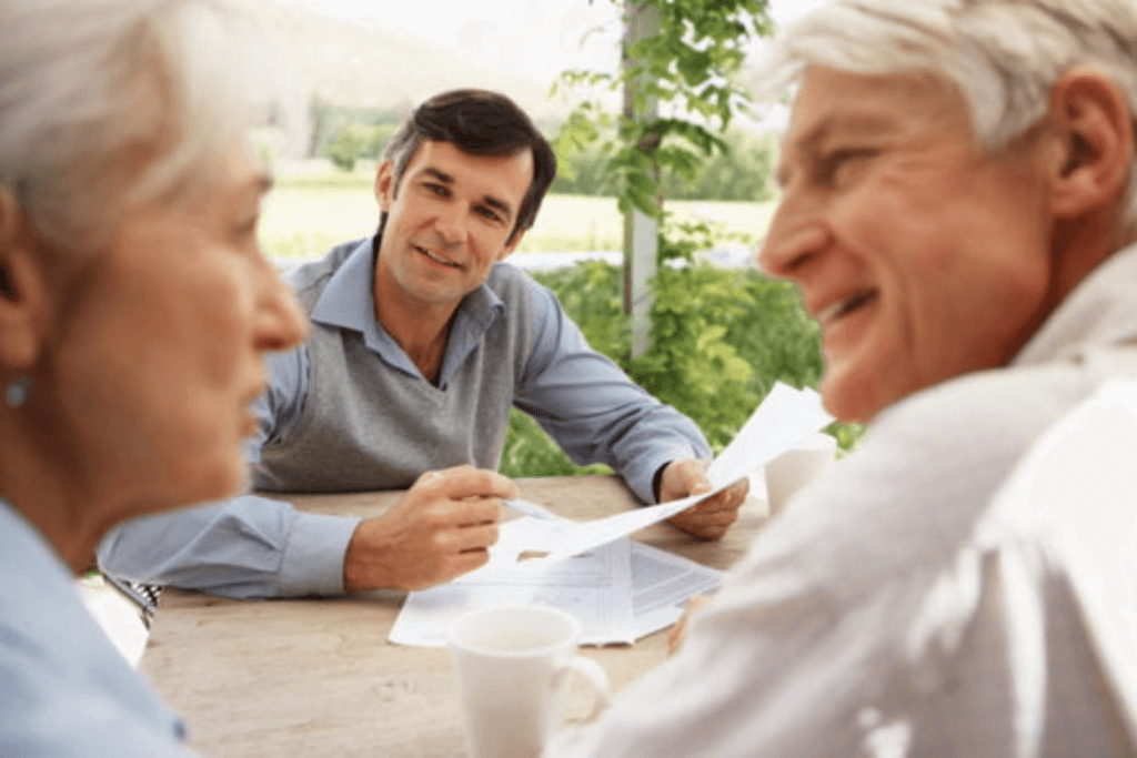 older couple with advisor discussing finances