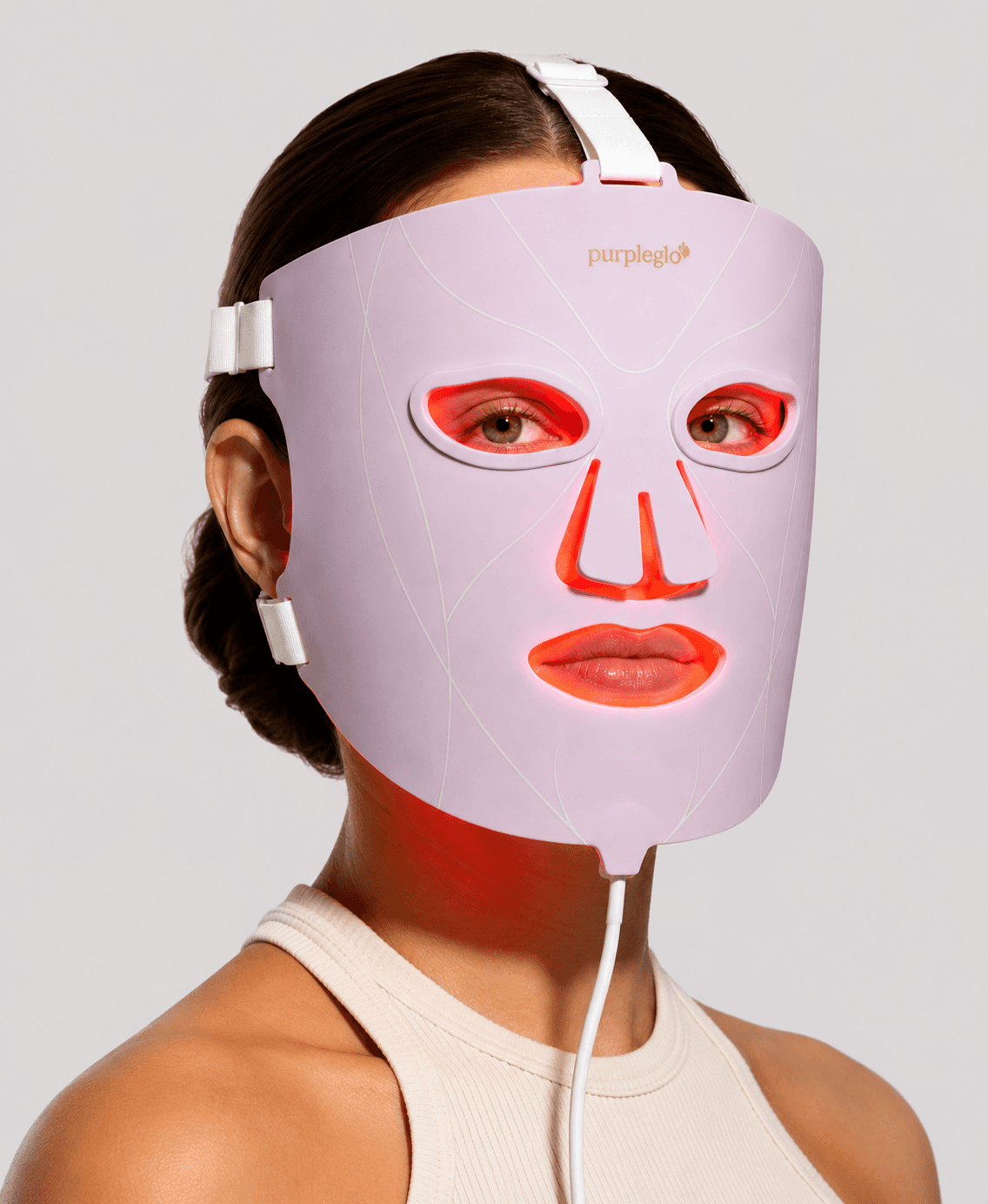 Asian woman in white turtleneck sweater with eyes closed