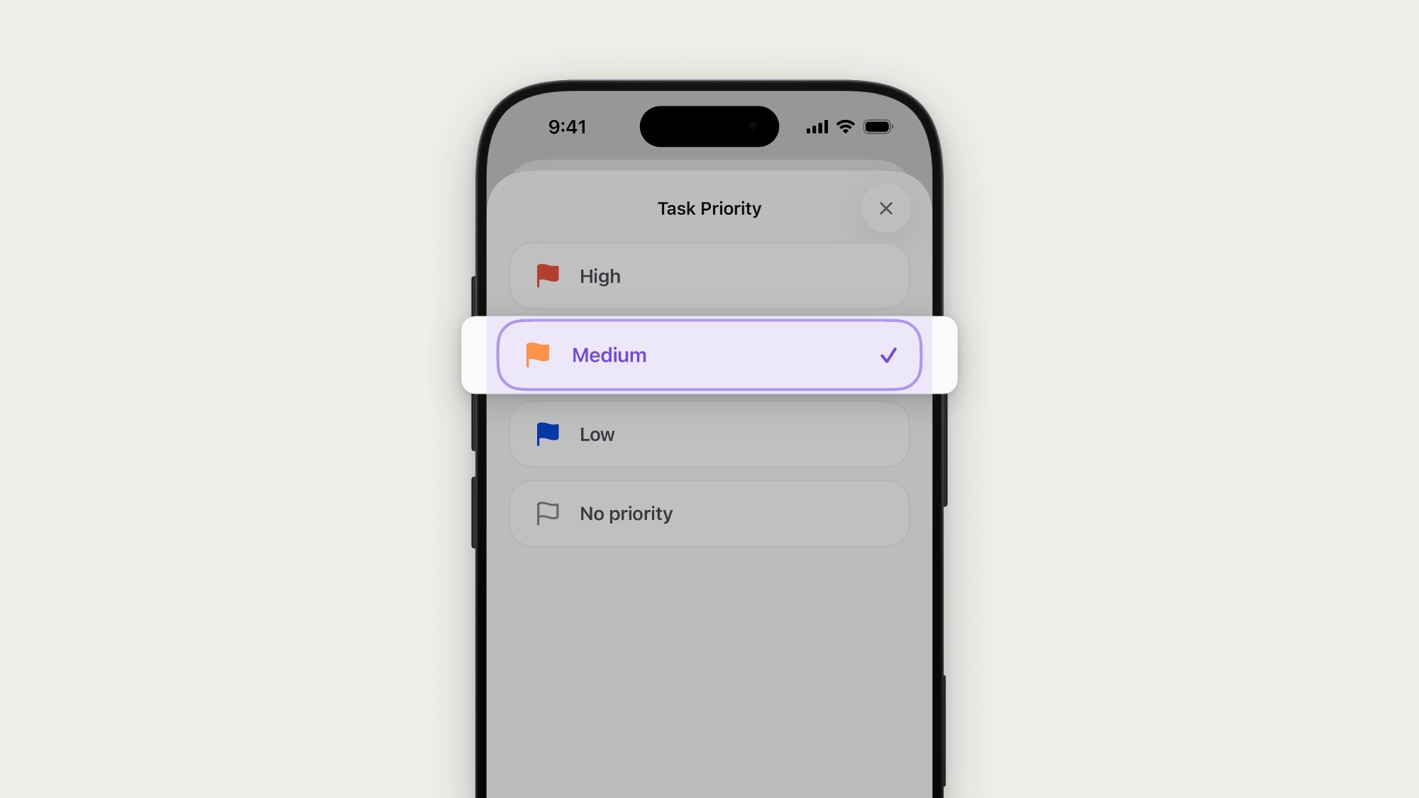 The same iPhone and Task Priority sheet on a flat, very light gray-green background