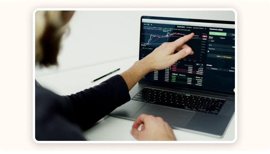 person analyzing charts