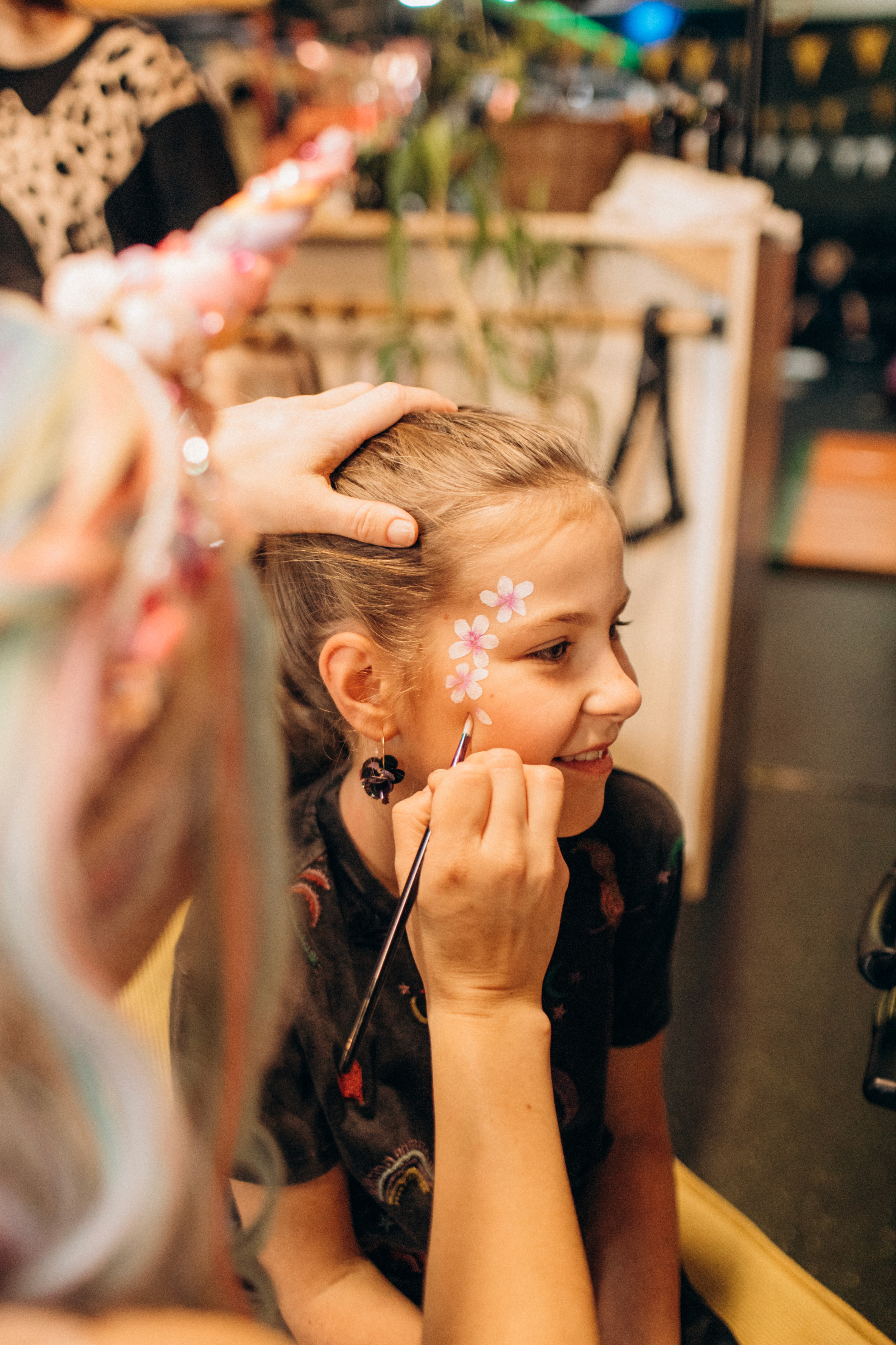 A man stading with Surfboard