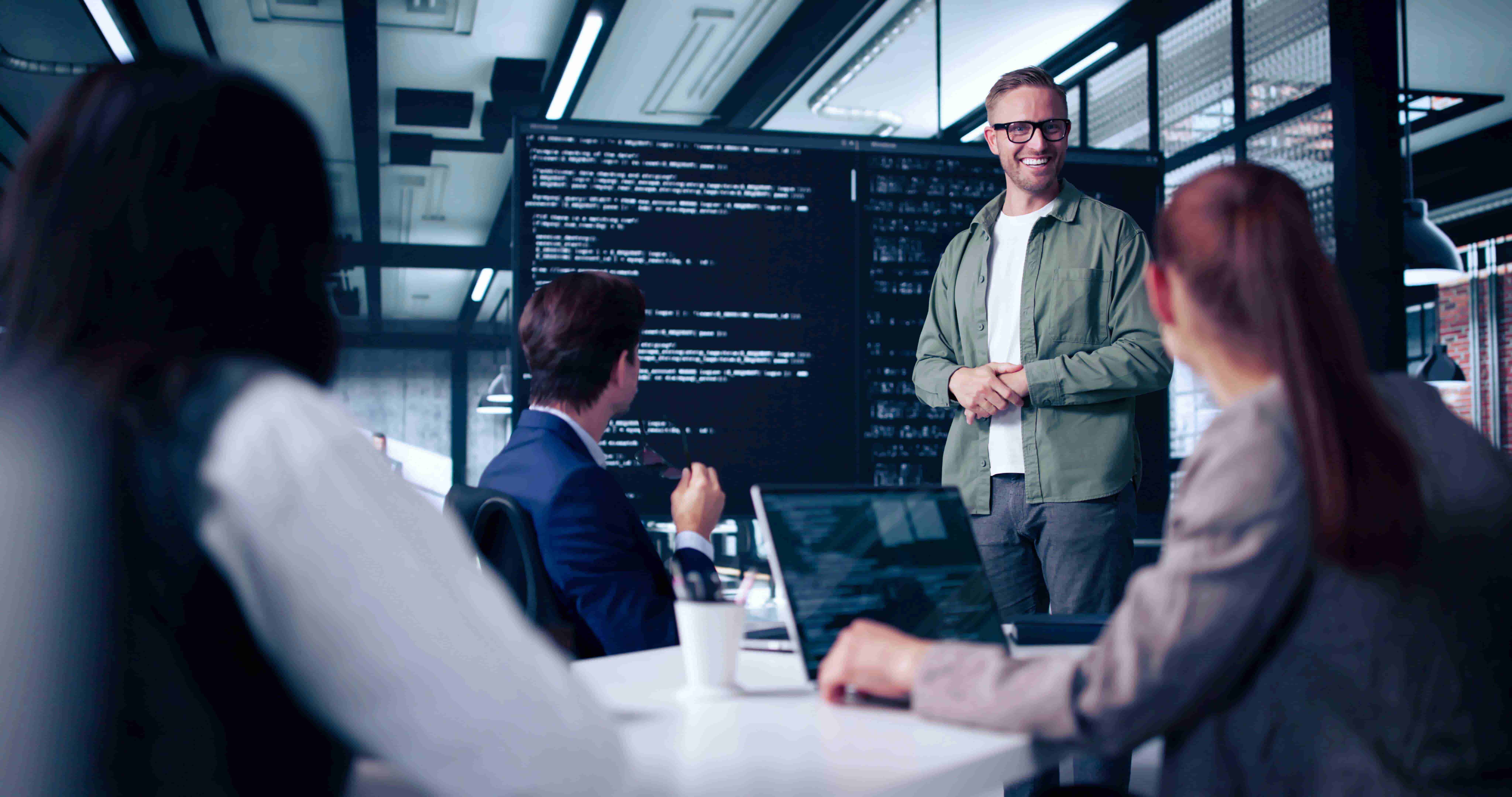 A group of people having a meeting at the office