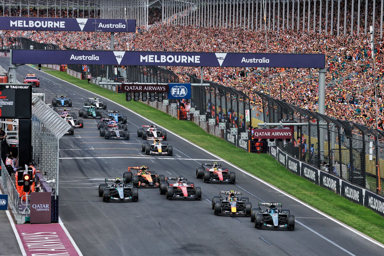 Red Formula 1 car on a race track