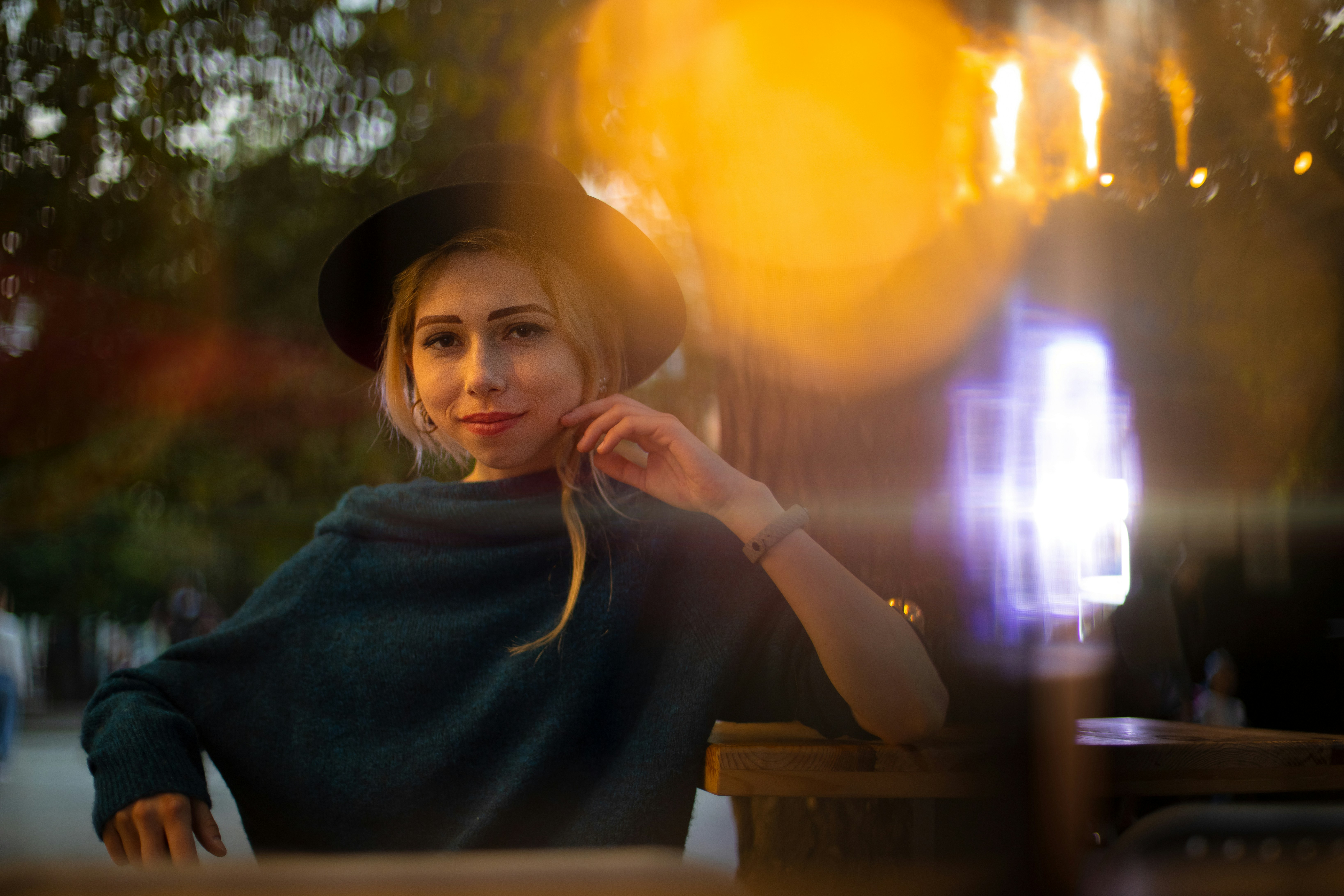 woman sitting in a bar - What Season Am I