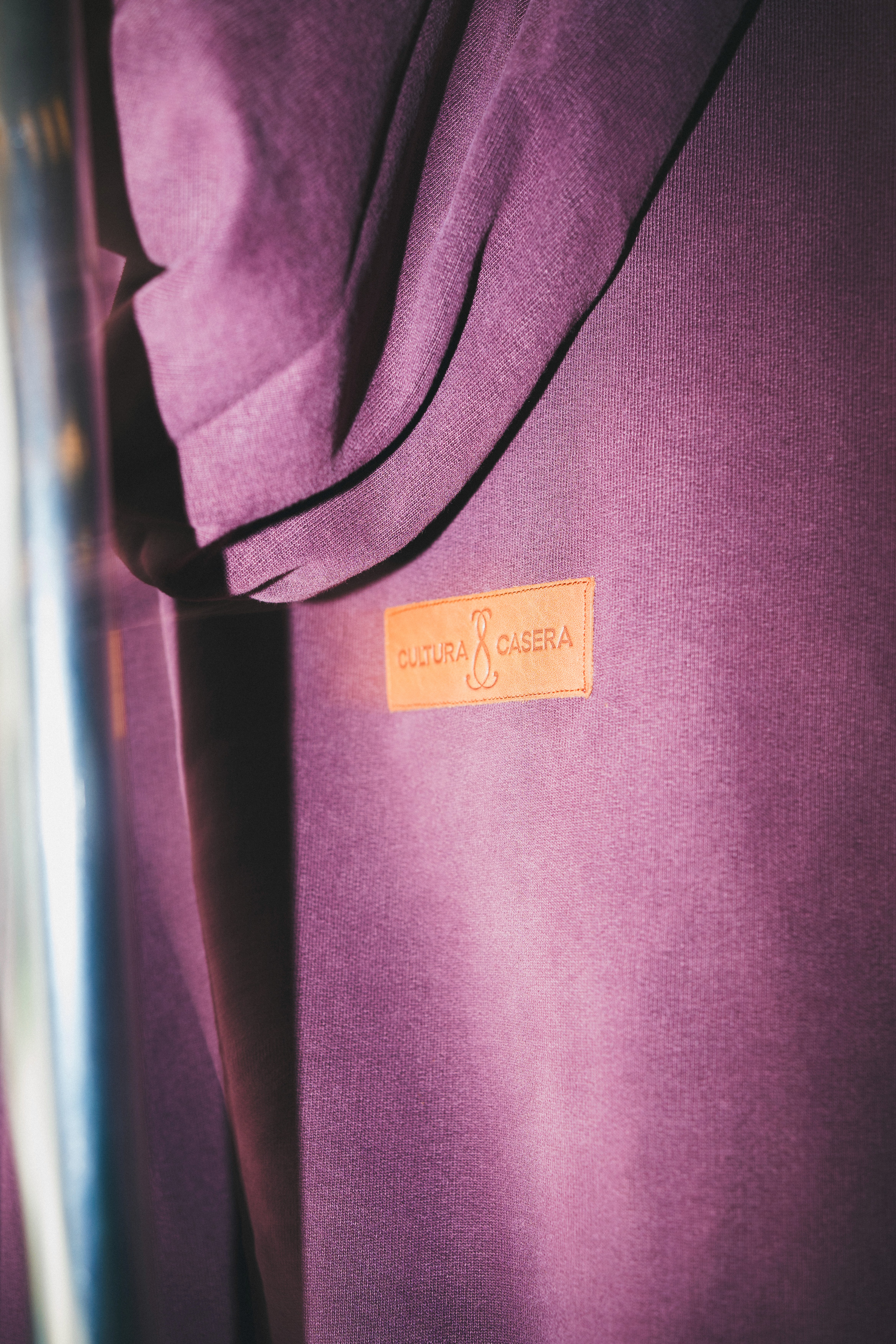  A woman in a helmet with a light trail, suggesting movement or speed in a dynamic outdoor setting.