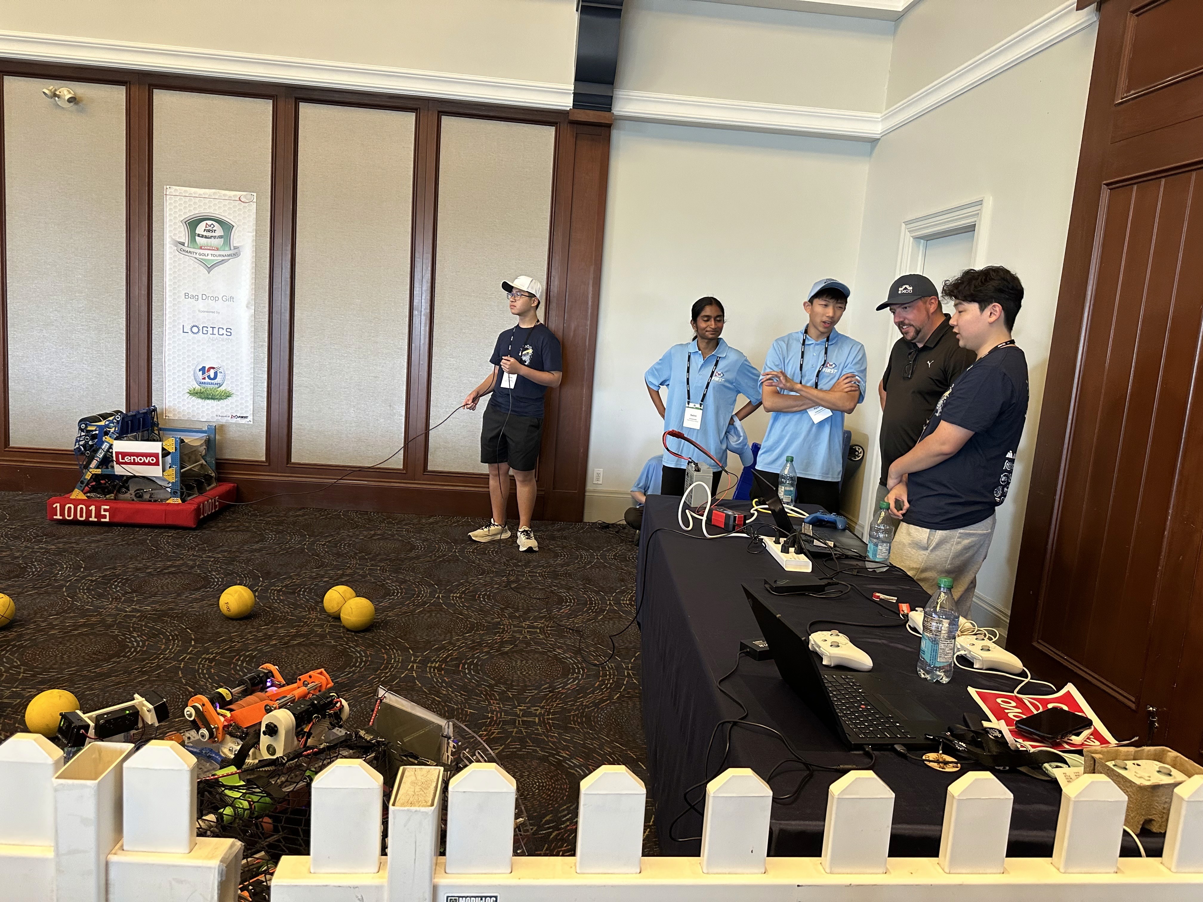 Students from FRC 10015 Bubbles explains our 2026 robot Ballista to FIRST Canada sponsors at the Angus Glen Golf event.