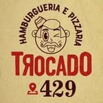 Logotipo da Trocado Pizzaria, representando pizzaria especializada em pizzas artesanais, com identidade visual profissional e foco em qualidade e sabor.