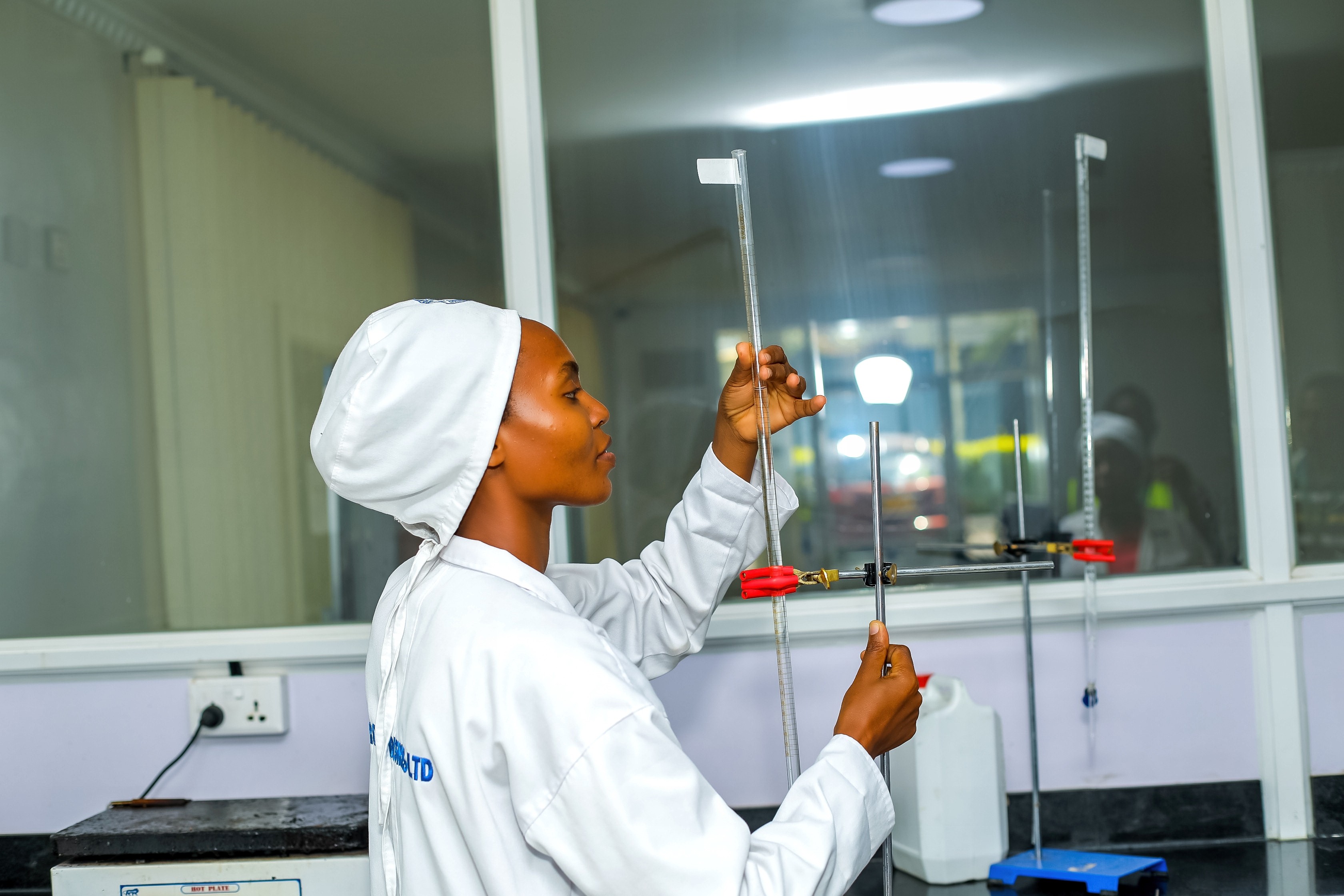 Scientist examine solution